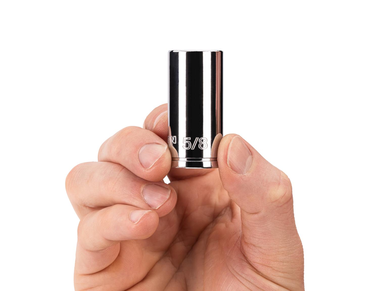 Person holding Tekton 5/8 inch hand drive 6-point socket. Item #SHD14016