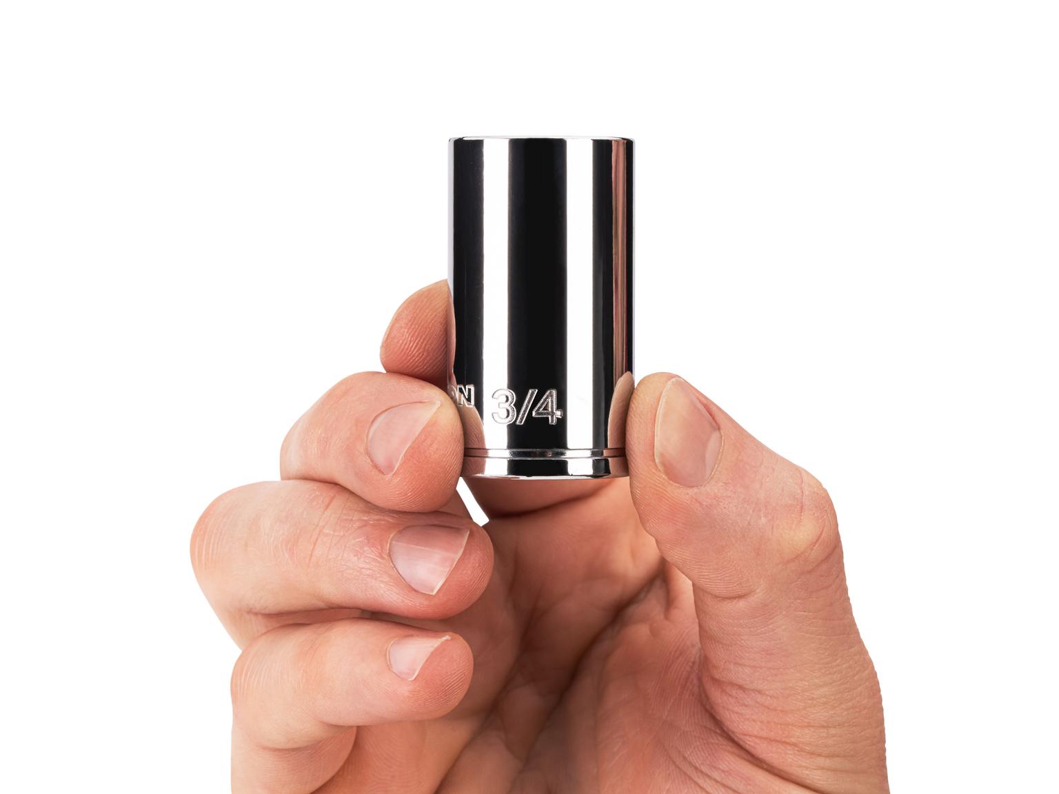 Person holding Tekton 3/4 inch hand drive 6-point socket. Item #SHD14019