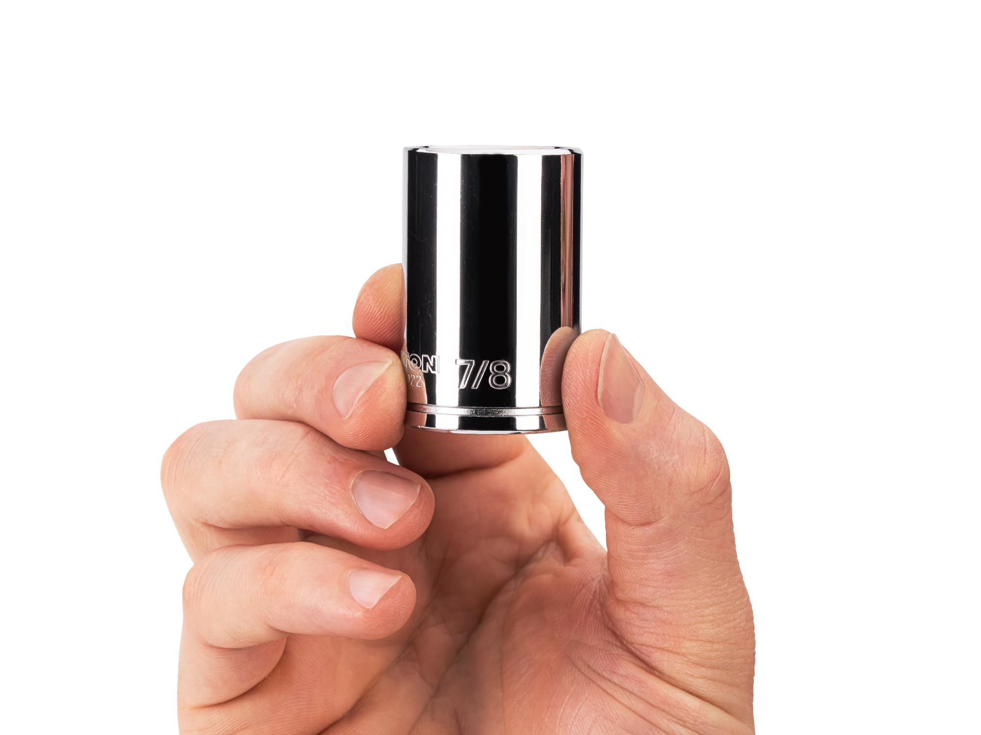 Person holding Tekton hand drive 6-point socket. Item #SHD14022