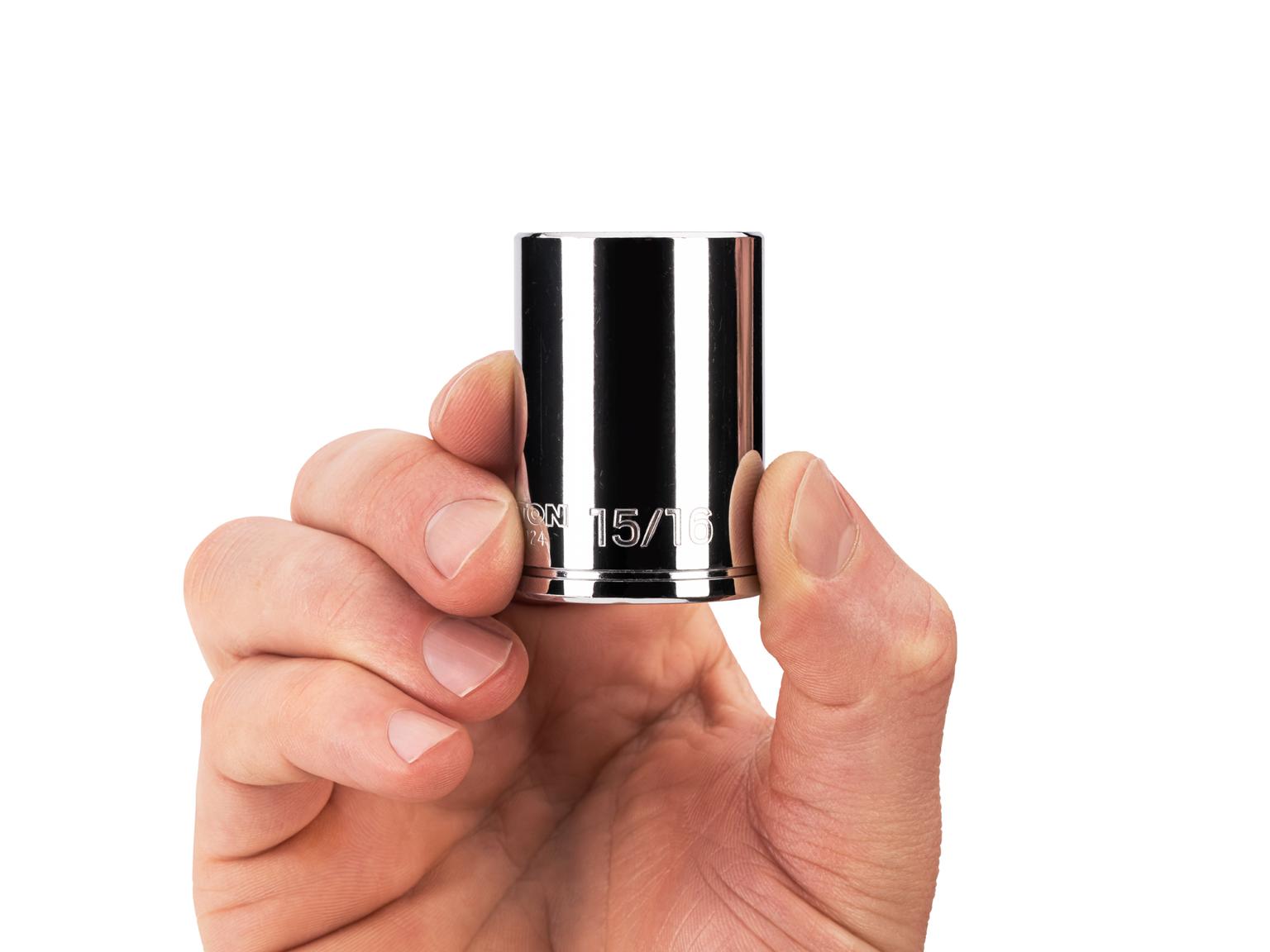 Person holding Tekton 15/16 inch hand drive 6-point socket. Item #SHD14024