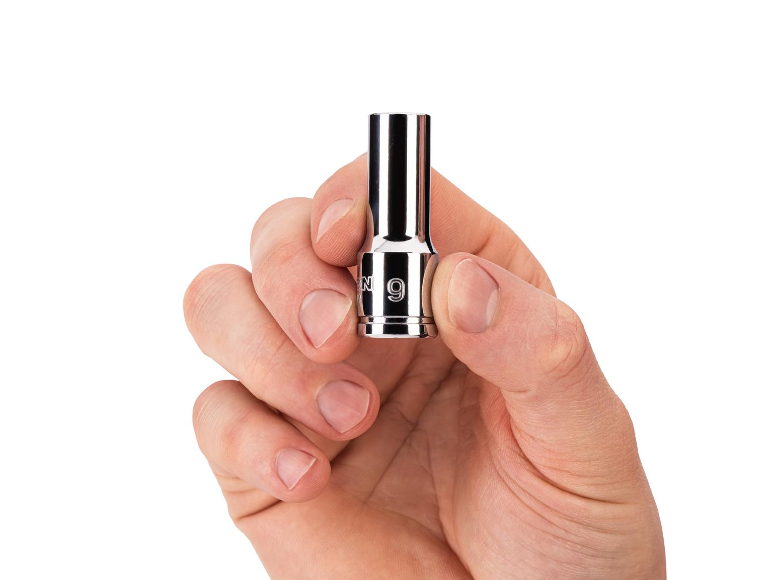 Person holding Tekton 9 millimeter hand drive 6-point socket. Item #SHD14109