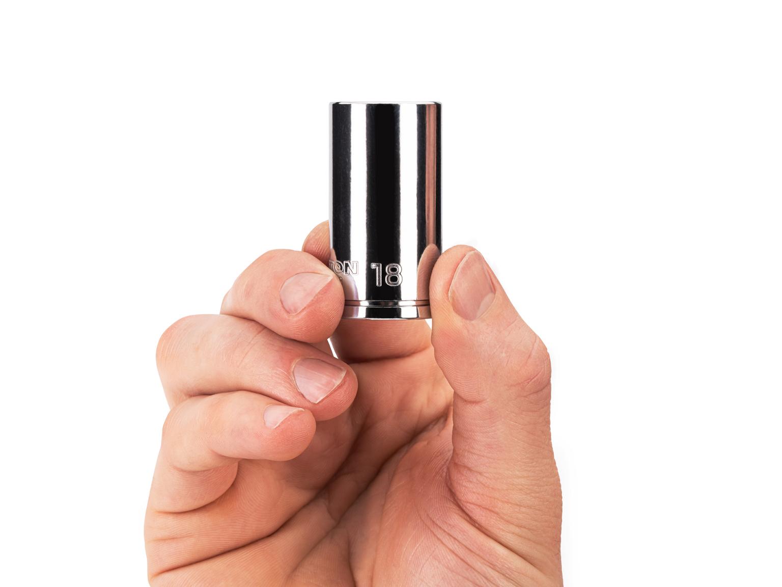 Person holding Tekton 18 millimeter hand drive 6-point socket. Item #SHD14118