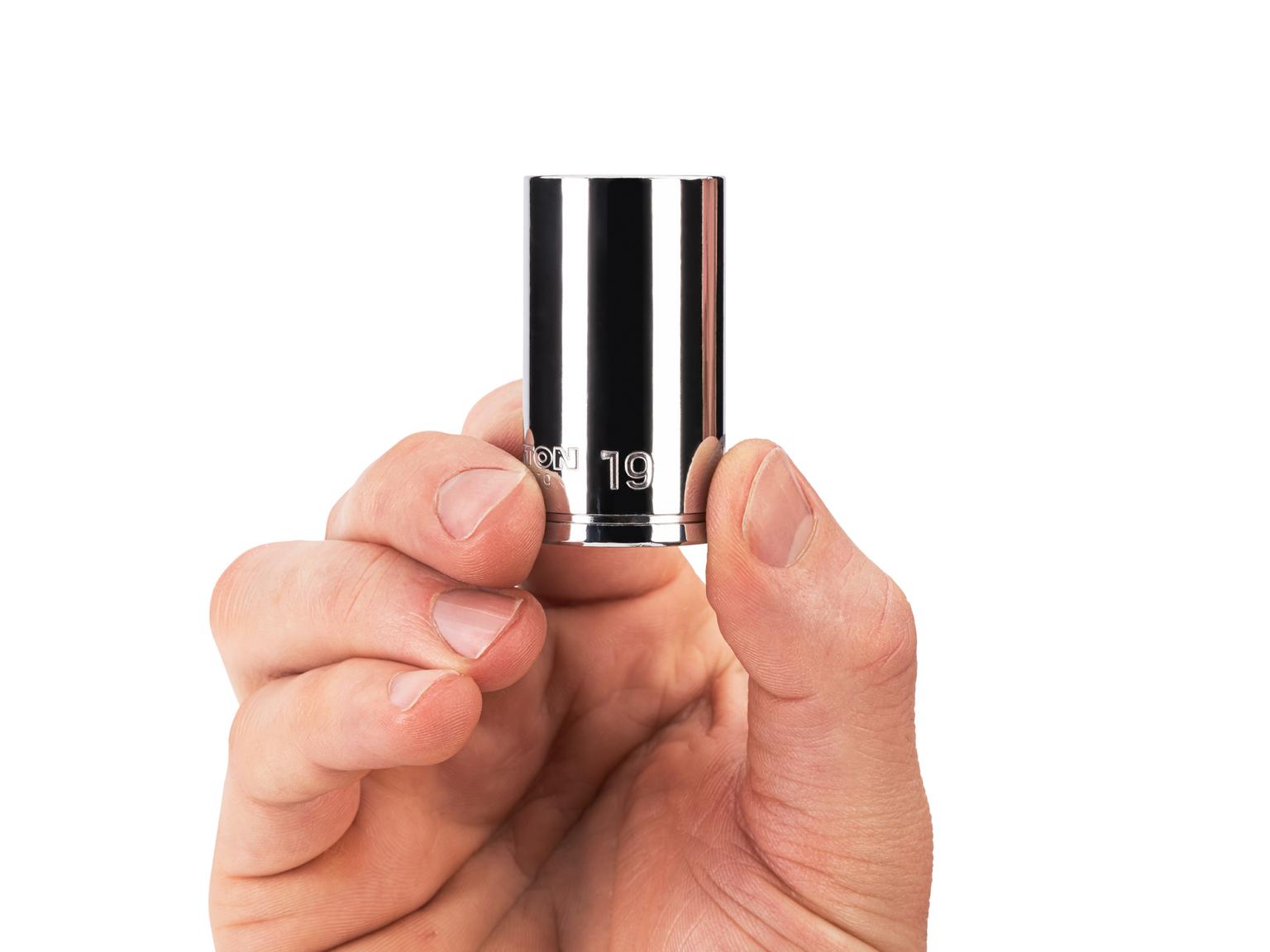 Person holding Tekton 19 millimeter hand drive 6-point socket. Item #SHD14119