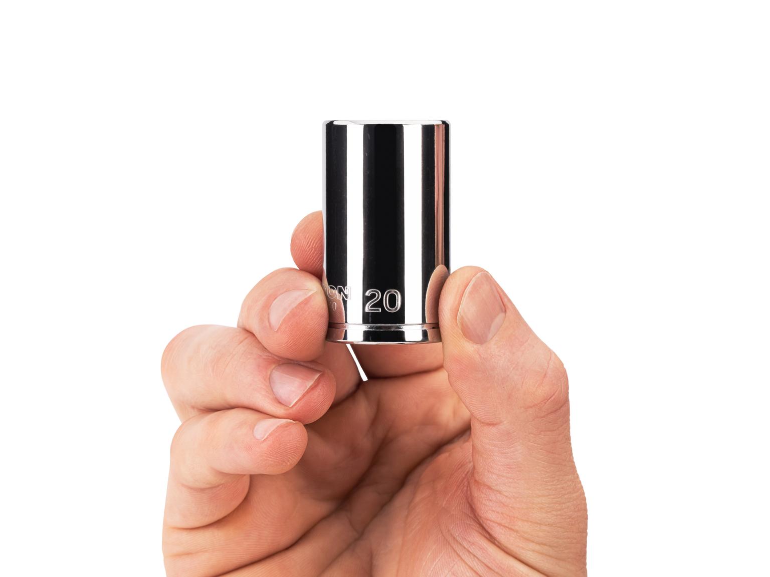 Person holding Tekton 20 millimeter hand drive 6-point socket. Item #SHD14120