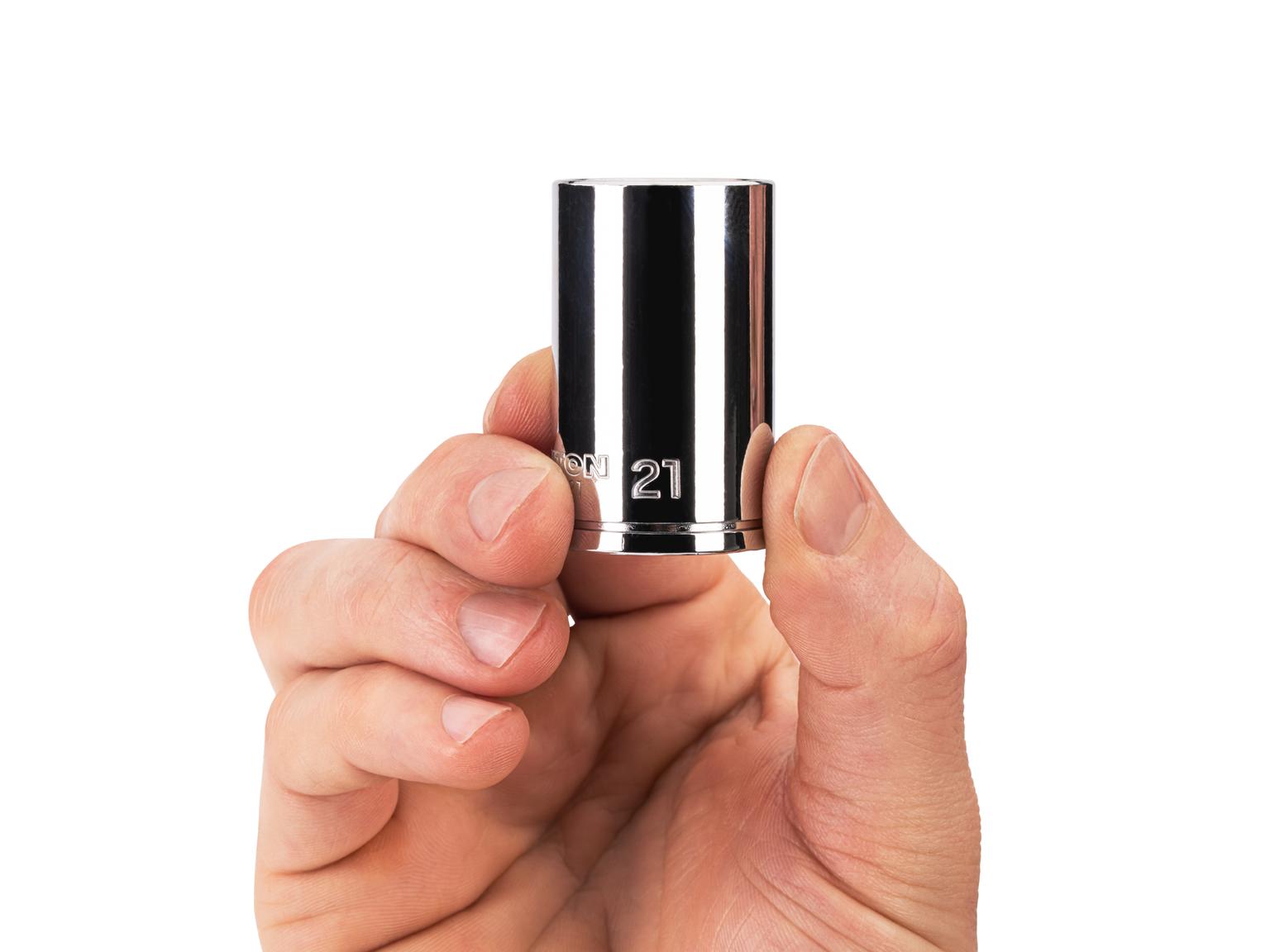Person holding Tekton 21 millimeter hand drive 6-point socket. Item #SHD14121