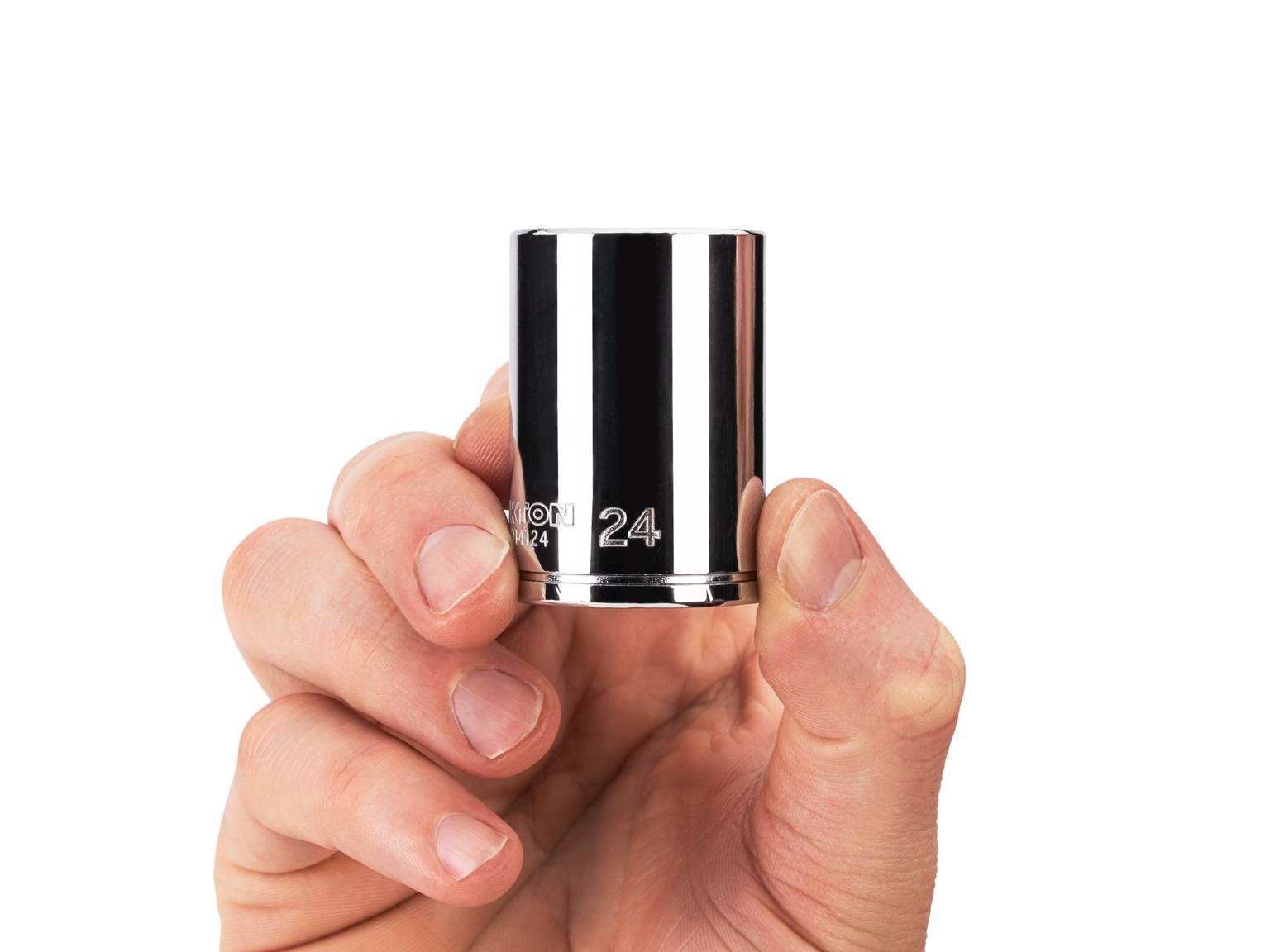 Person holding Tekton 24 millimeter hand drive 6-point socket. Item #SHD14124