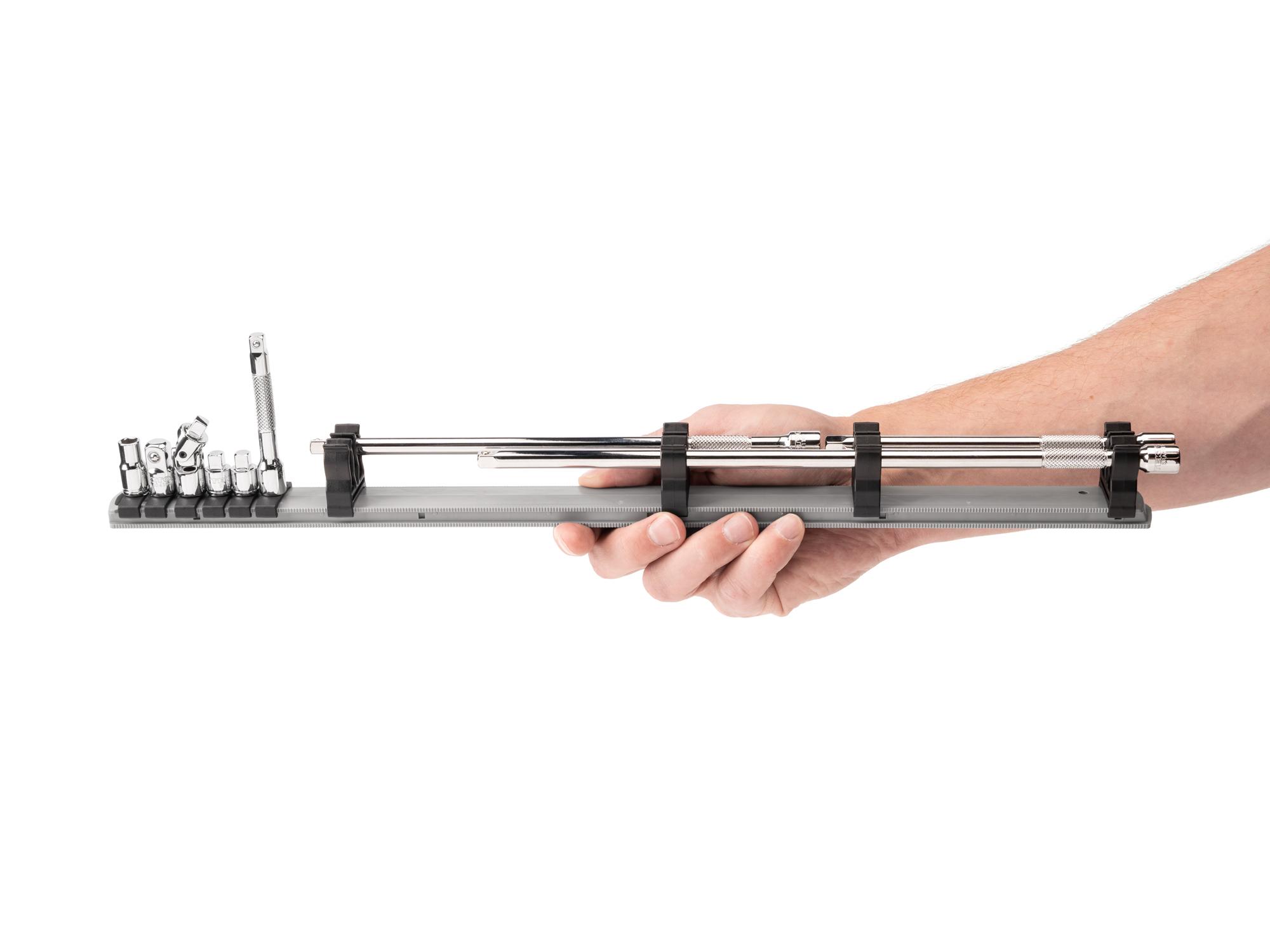 Person holding Tekton rail hand drive accessory set. Item #SHA90101