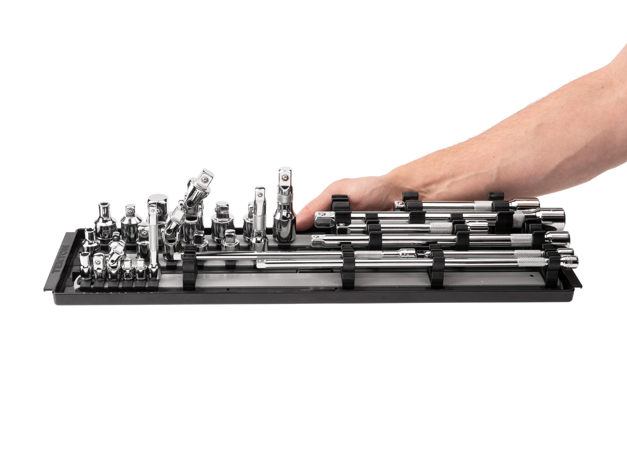 Person holding Tekton 19.7 hand drive accessory set. Item #SHA99201