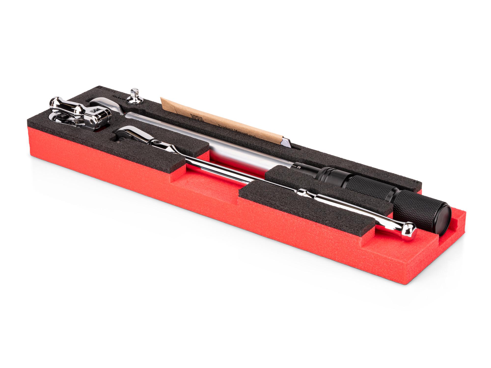 Angled view of red Tekton 3/8 inch drive torque wrench and ratchets set. SKT18401