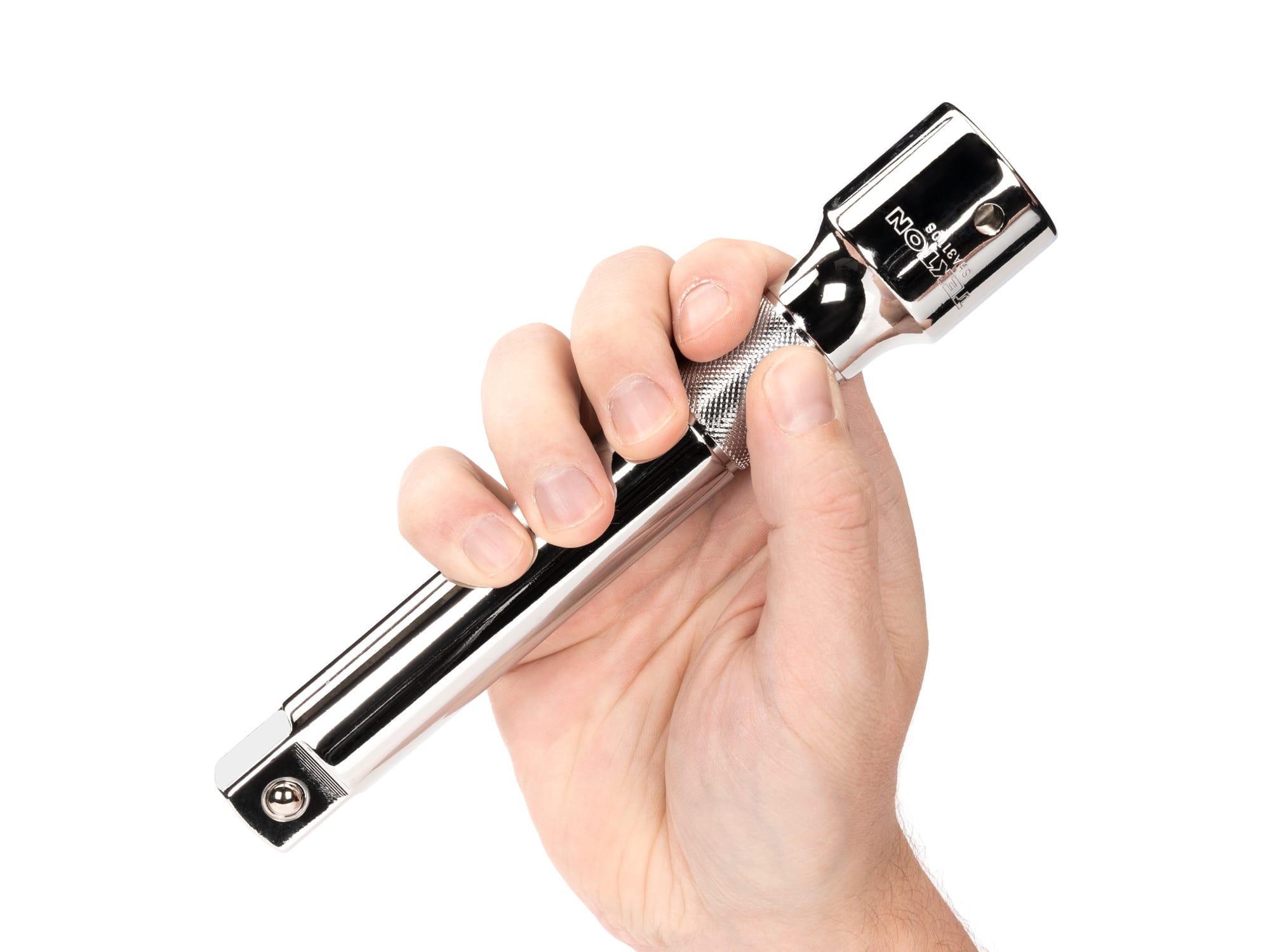 Person holding Tekton 8 inch hand drive accessory. Item #SHA31108