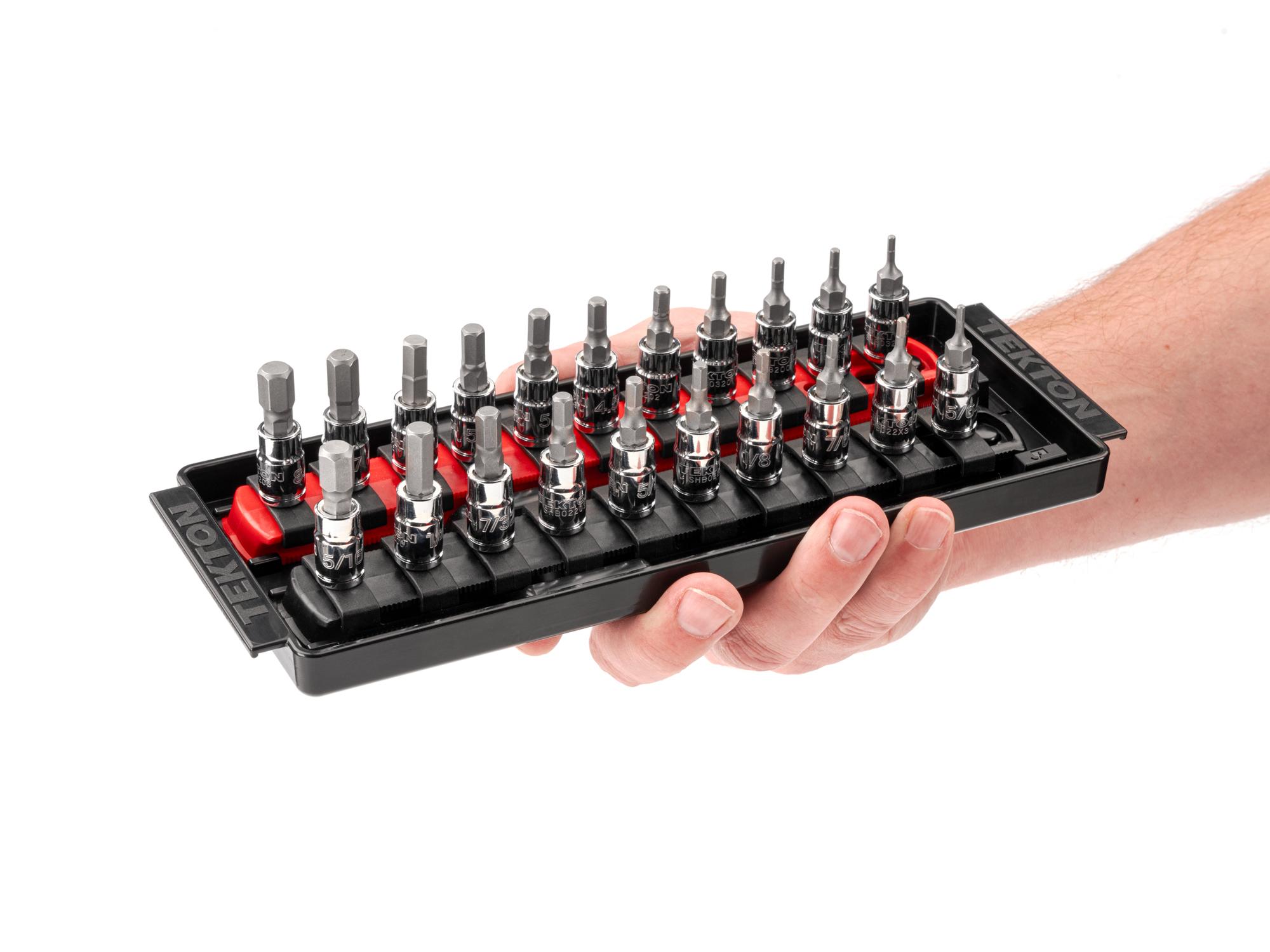 Person holding Tekton rail and tray hand drive bit socket set. Item #SHB90203