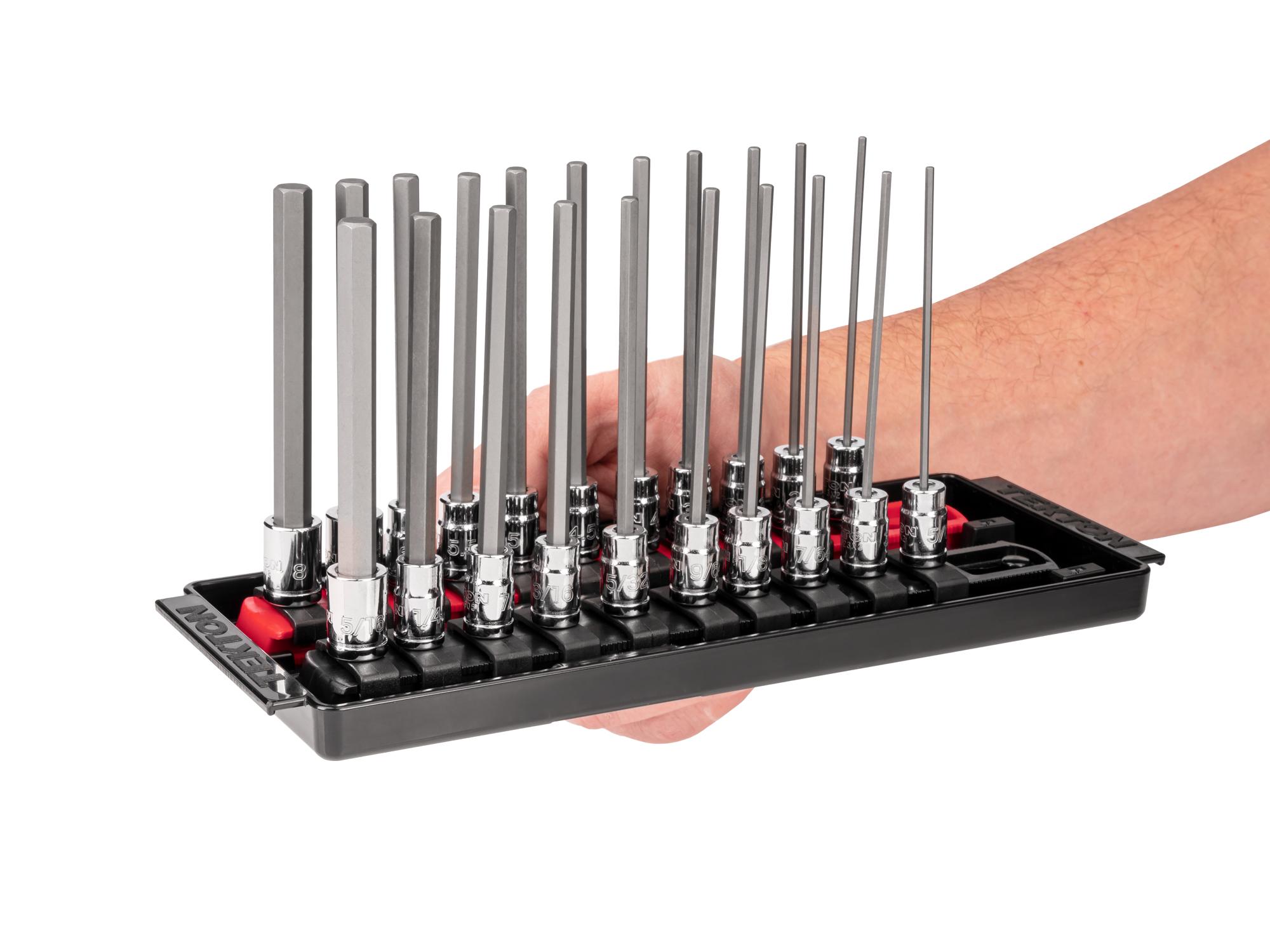 Person holding Tekton rail and tray hand drive bit socket set. Item #SHB90206