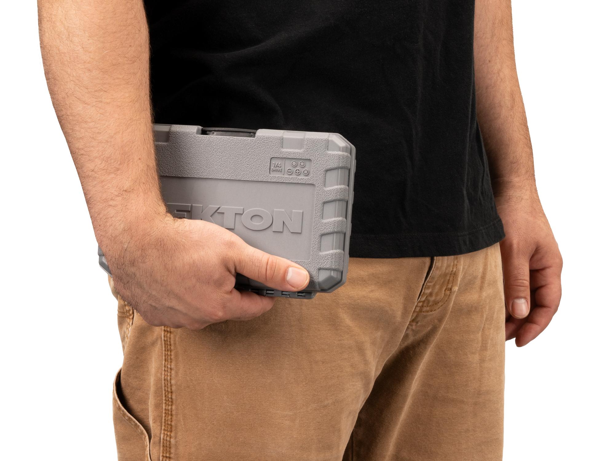 Person holding Tekton case hand drive bit socket set. Item #SHB90302