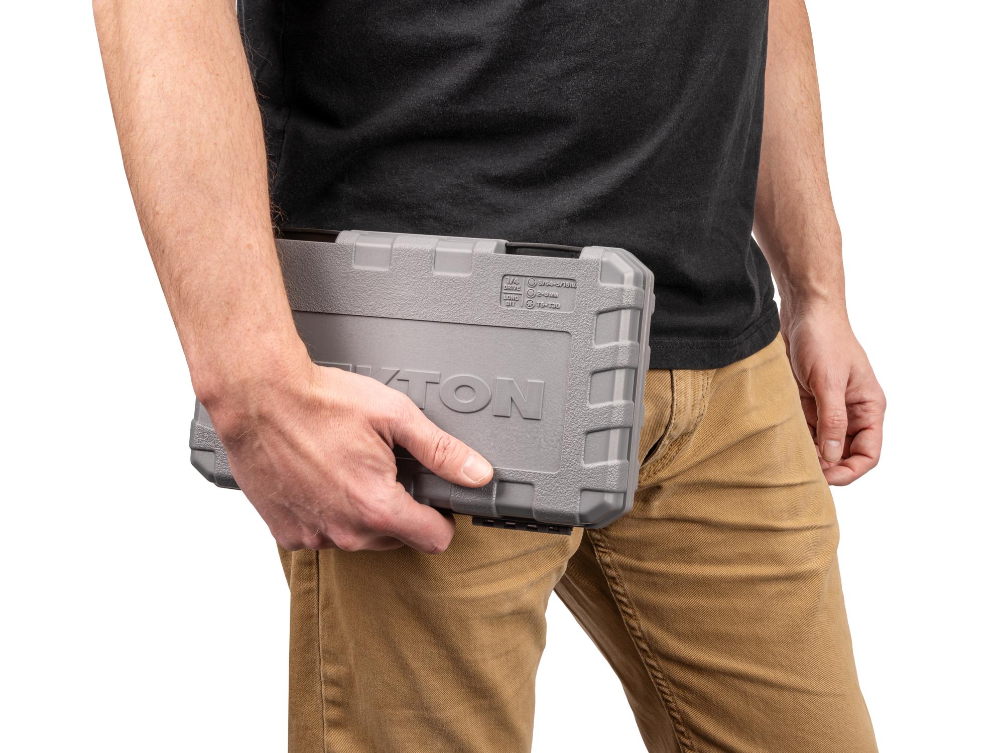 Person holding Tekton case hand drive bit socket set. Item #SHB90303
