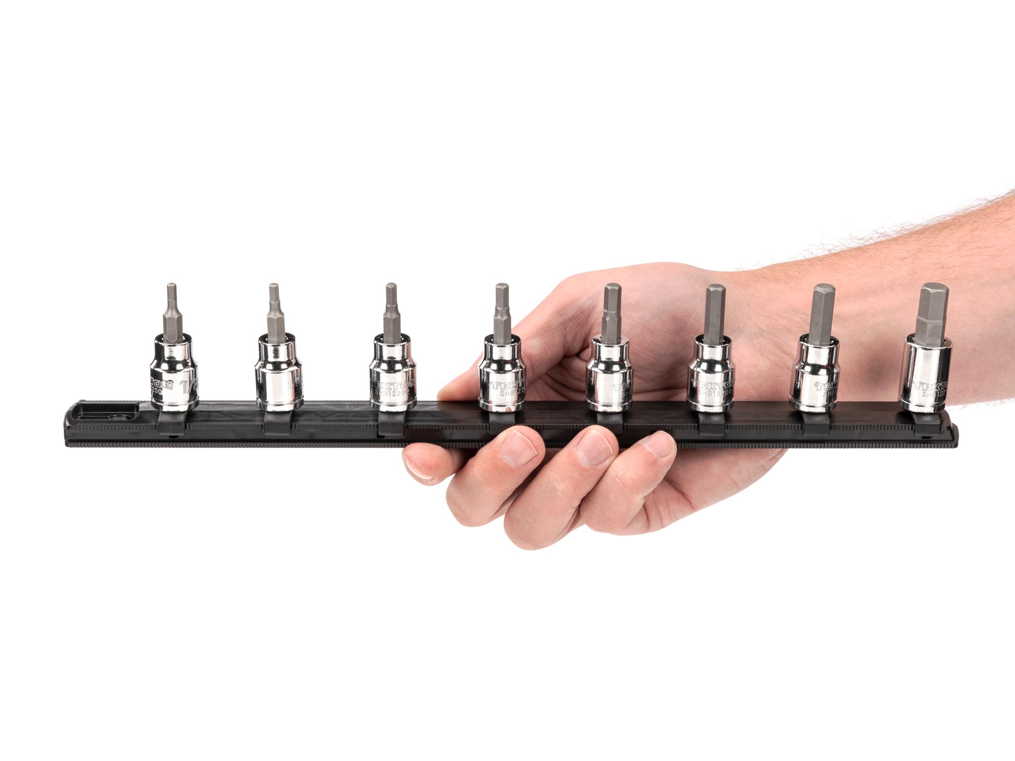 Person holding Tekton rail hand drive bit socket set. Item #SHB91106