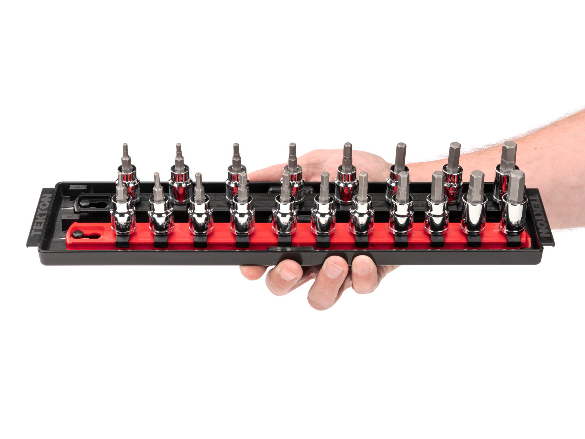 Person holding Tekton rail and tray hand drive bit socket set. Item #SHB91202