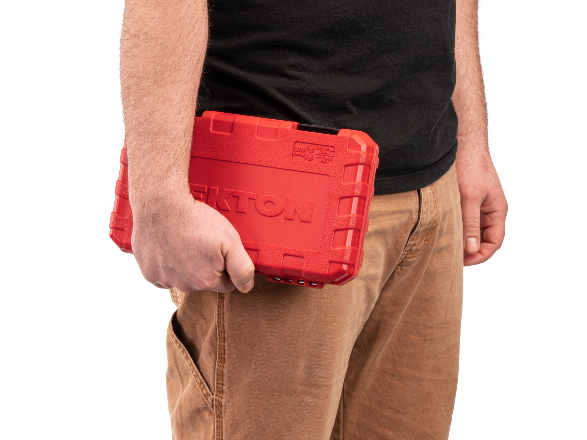 Person holding Tekton case hand drive bit socket set. Item #SHB91315