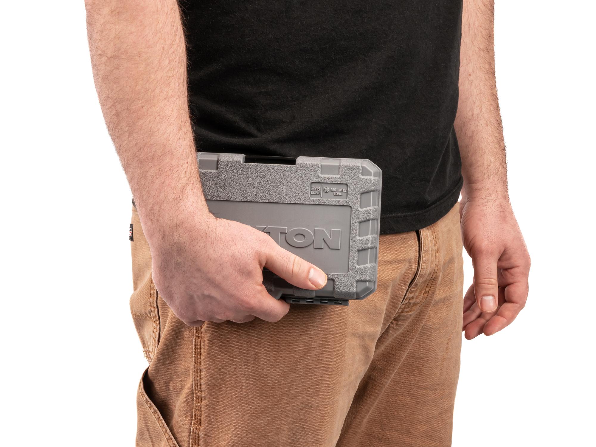 Person holding Tekton case hand drive bit socket set. Item #SHB91318