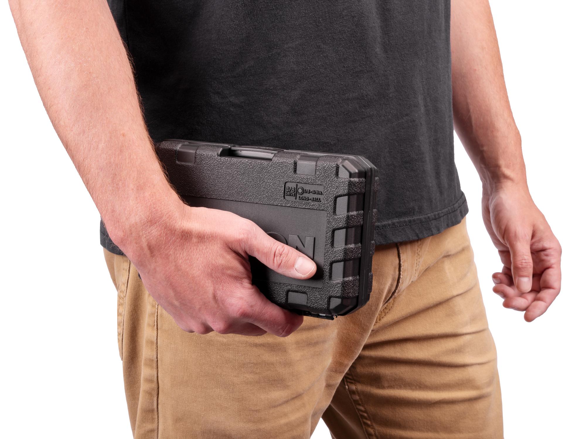Person holding Tekton case hand drive bit socket set. Item #SHB91319
