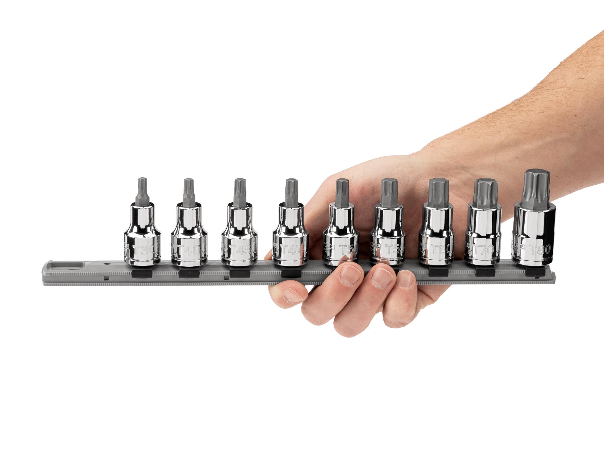 Person holding Tekton rail hand drive bit socket set. Item #SHB92107