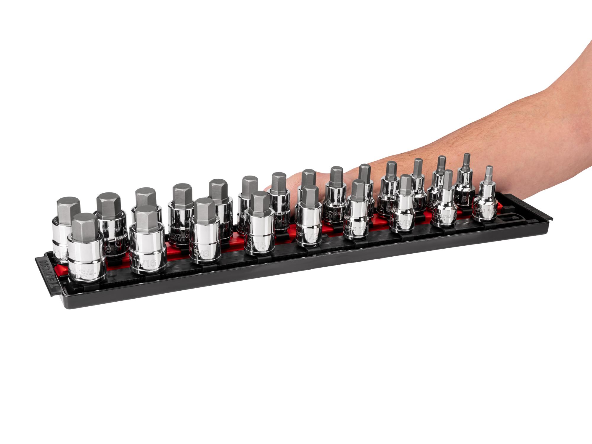Person holding Tekton rail and tray hand drive bit socket set. Item #SHB92202