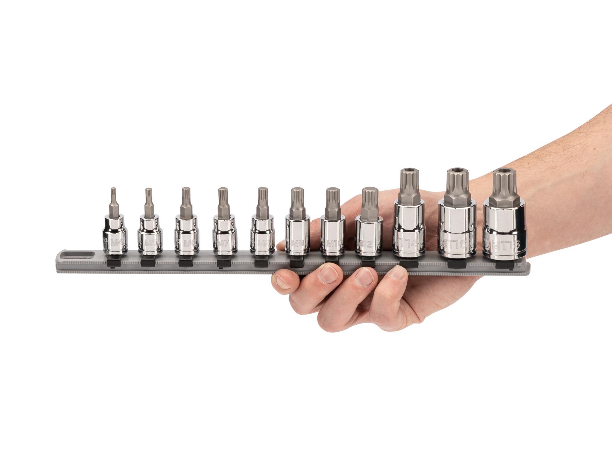 Person holding Tekton rail hand drive bit socket set. Item #SHB99100