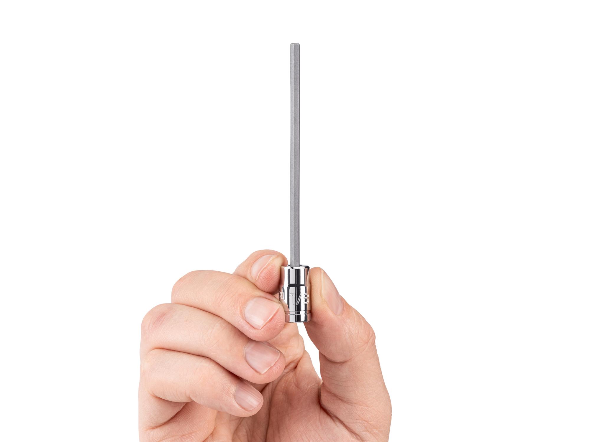 Person holding Tekton hand drive bit socket. Item #SHB02300