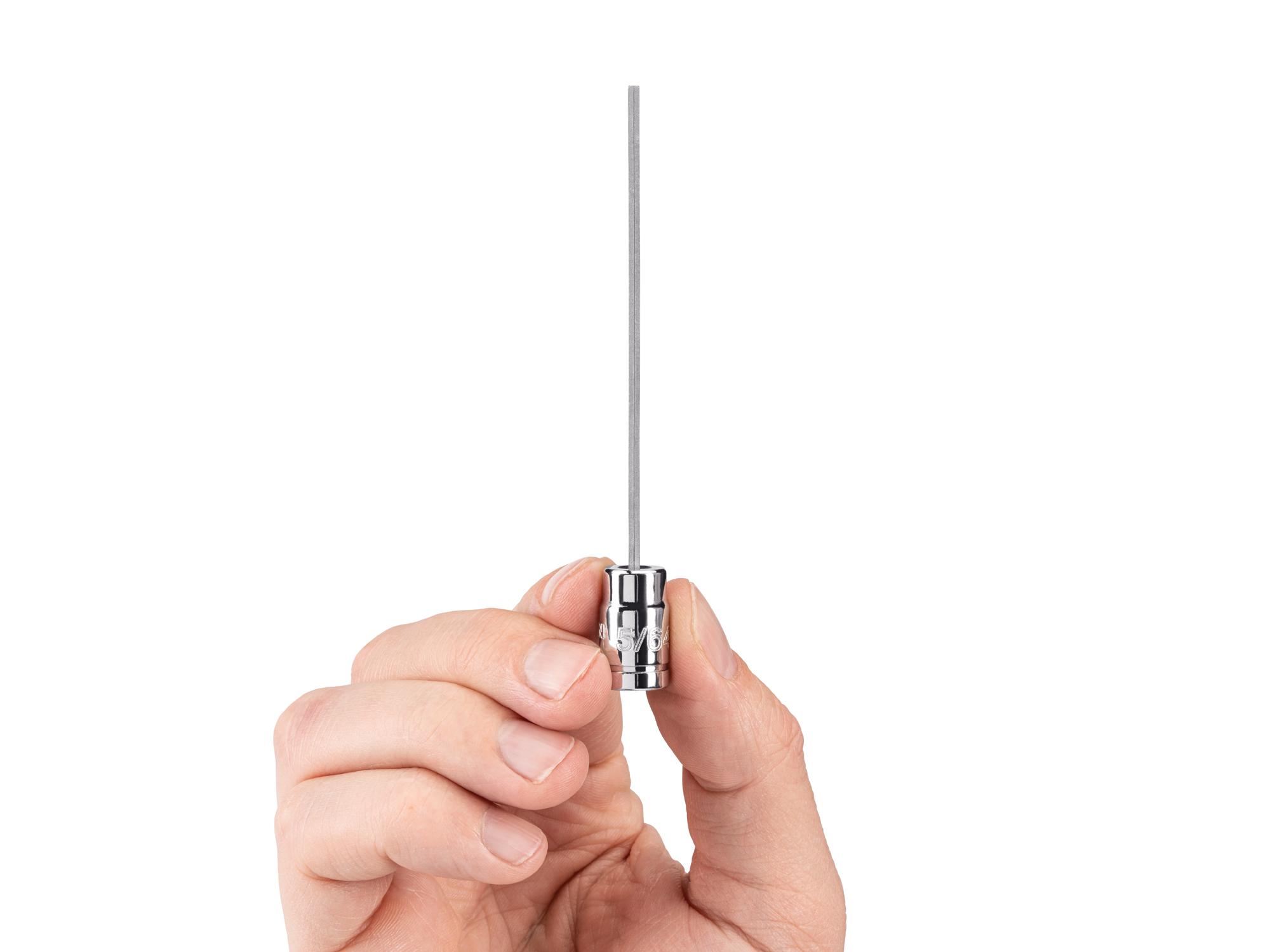 Person holding Tekton hand drive bit socket. Item #SHB023X2