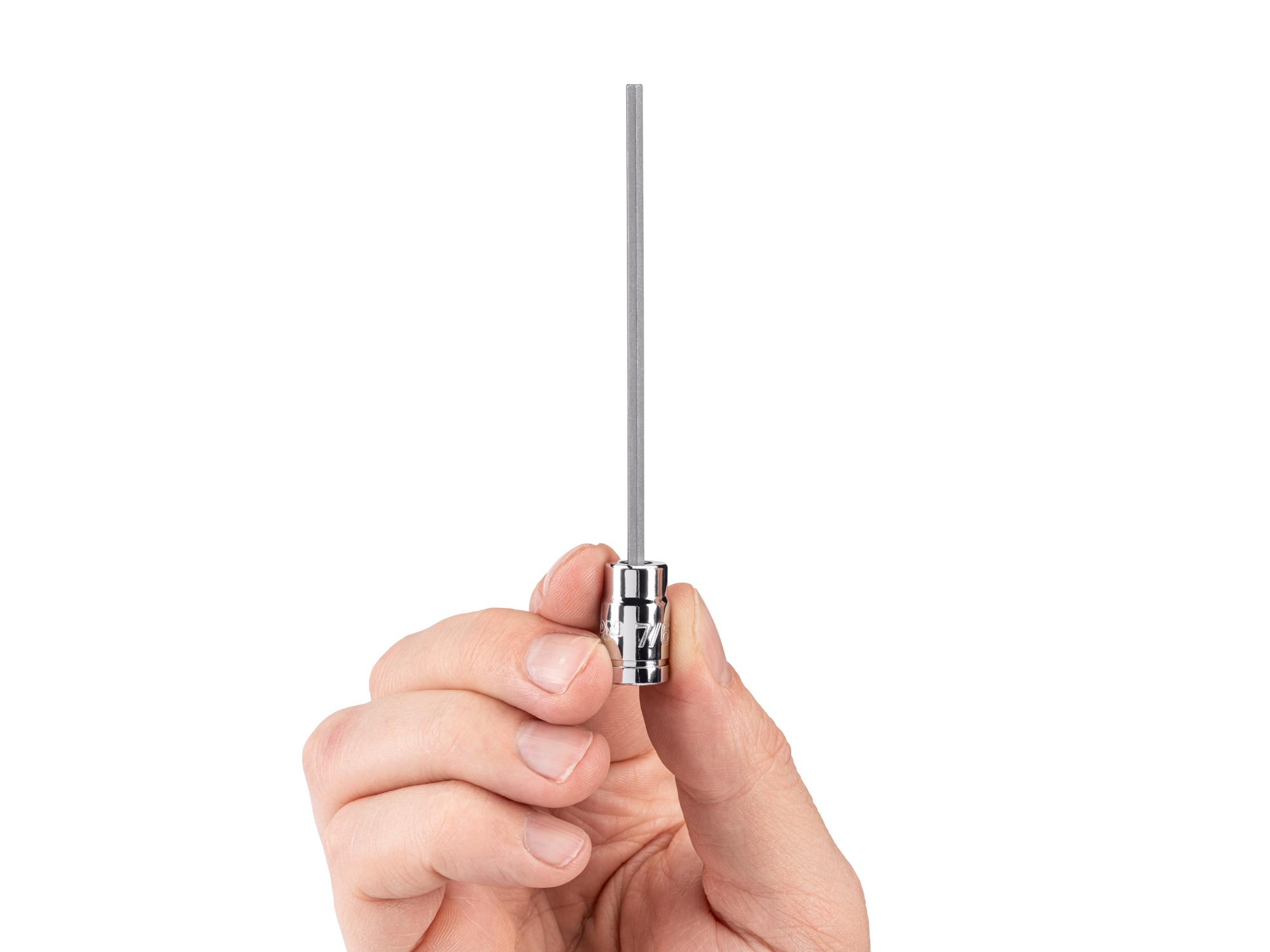 Person holding Tekton hand drive bit socket. Item #SHB023X4