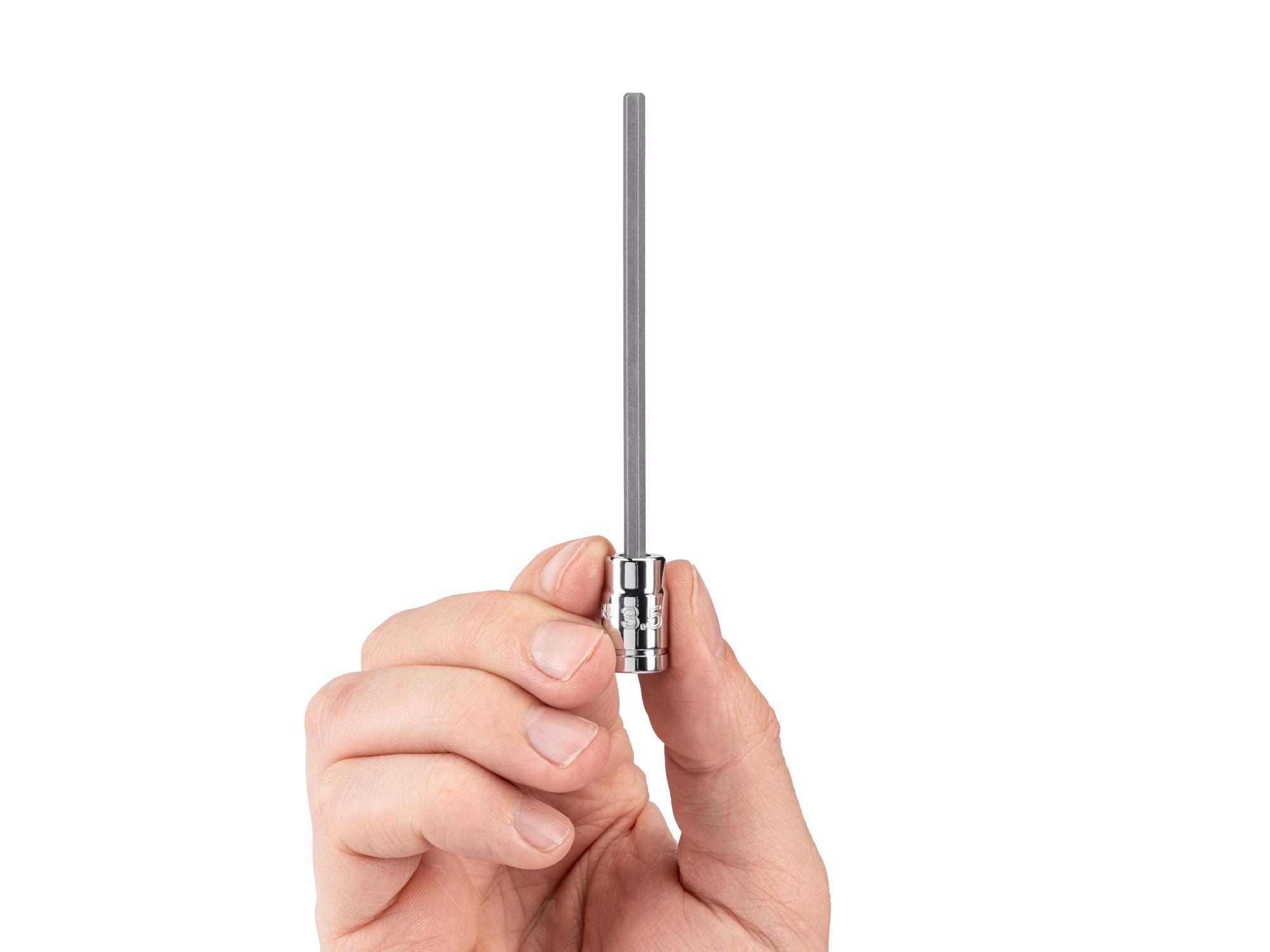 Person holding Tekton hand drive bit socket. Item #SHB03301
