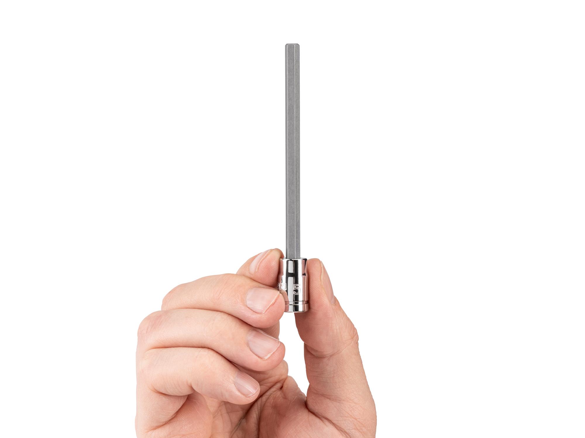 Person holding Tekton hand drive bit socket. Item #SHB03304