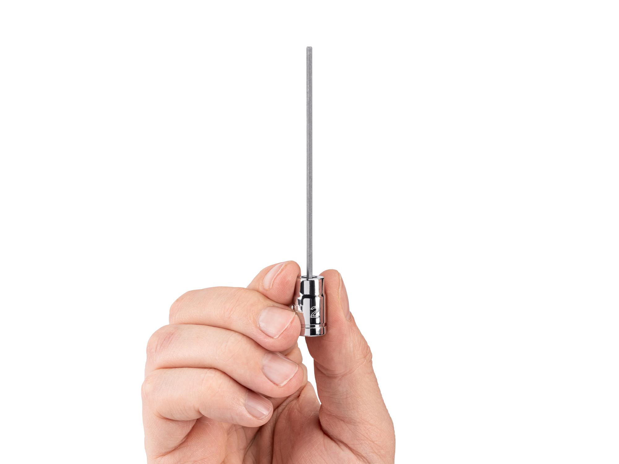 Person holding Tekton hand drive bit socket. Item #SHB033X2