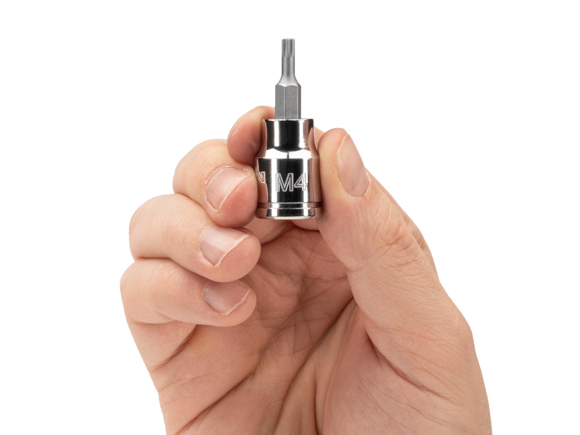 Person holding Tekton hand drive bit socket. Item #SHB18204