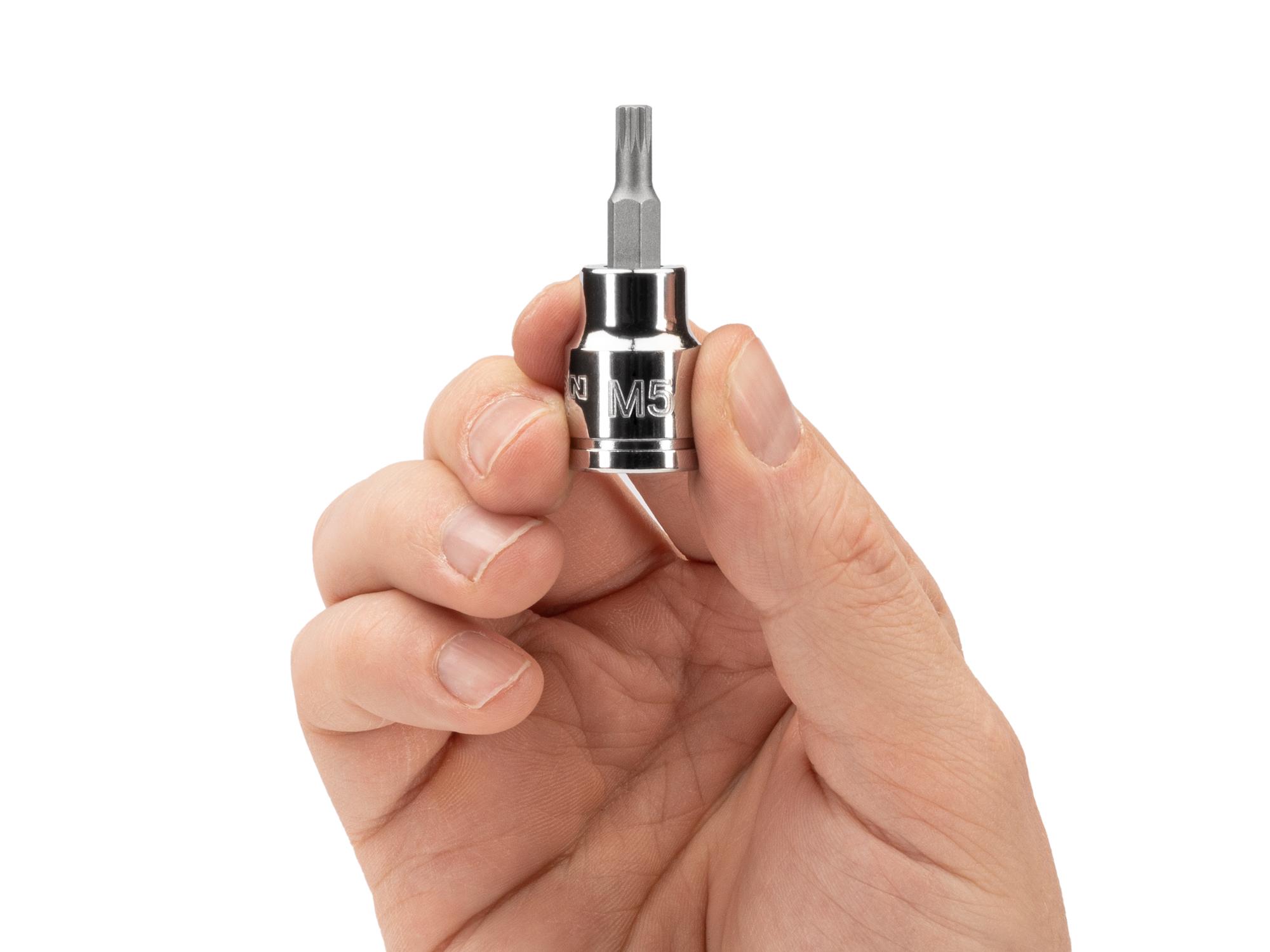 Person holding Tekton hand drive bit socket. Item #SHB18205