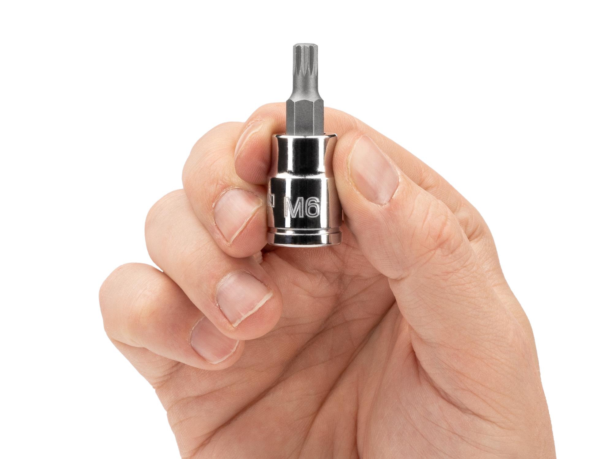Person holding Tekton hand drive bit socket. Item #SHB18206