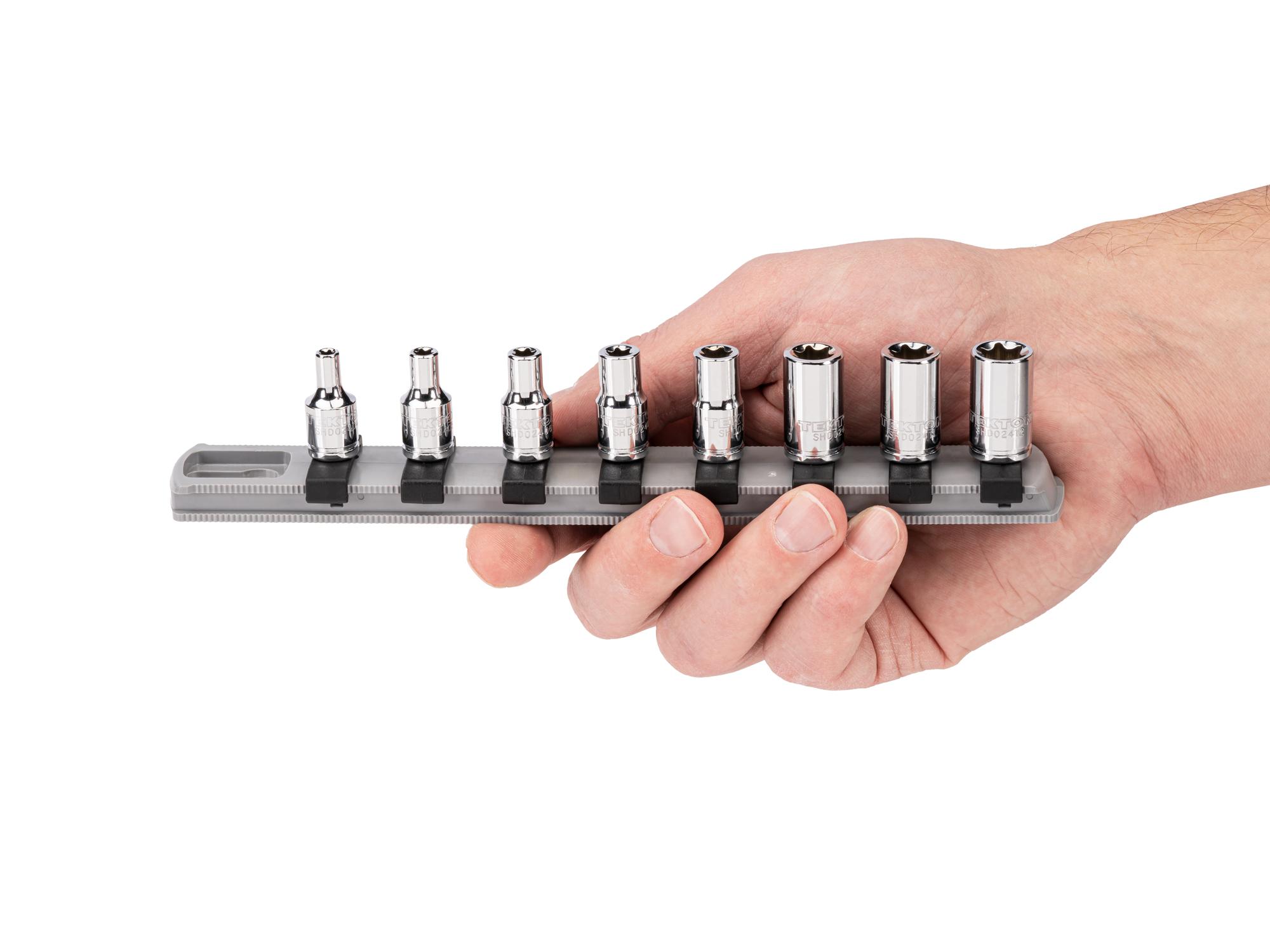 Person holding Tekton rail hand drive external star socket set. Item #SHD90115