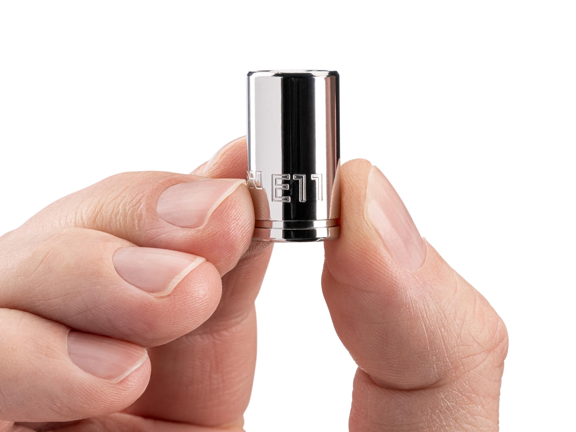 Person holding Tekton hand drive external star socket. Item #SHD02411