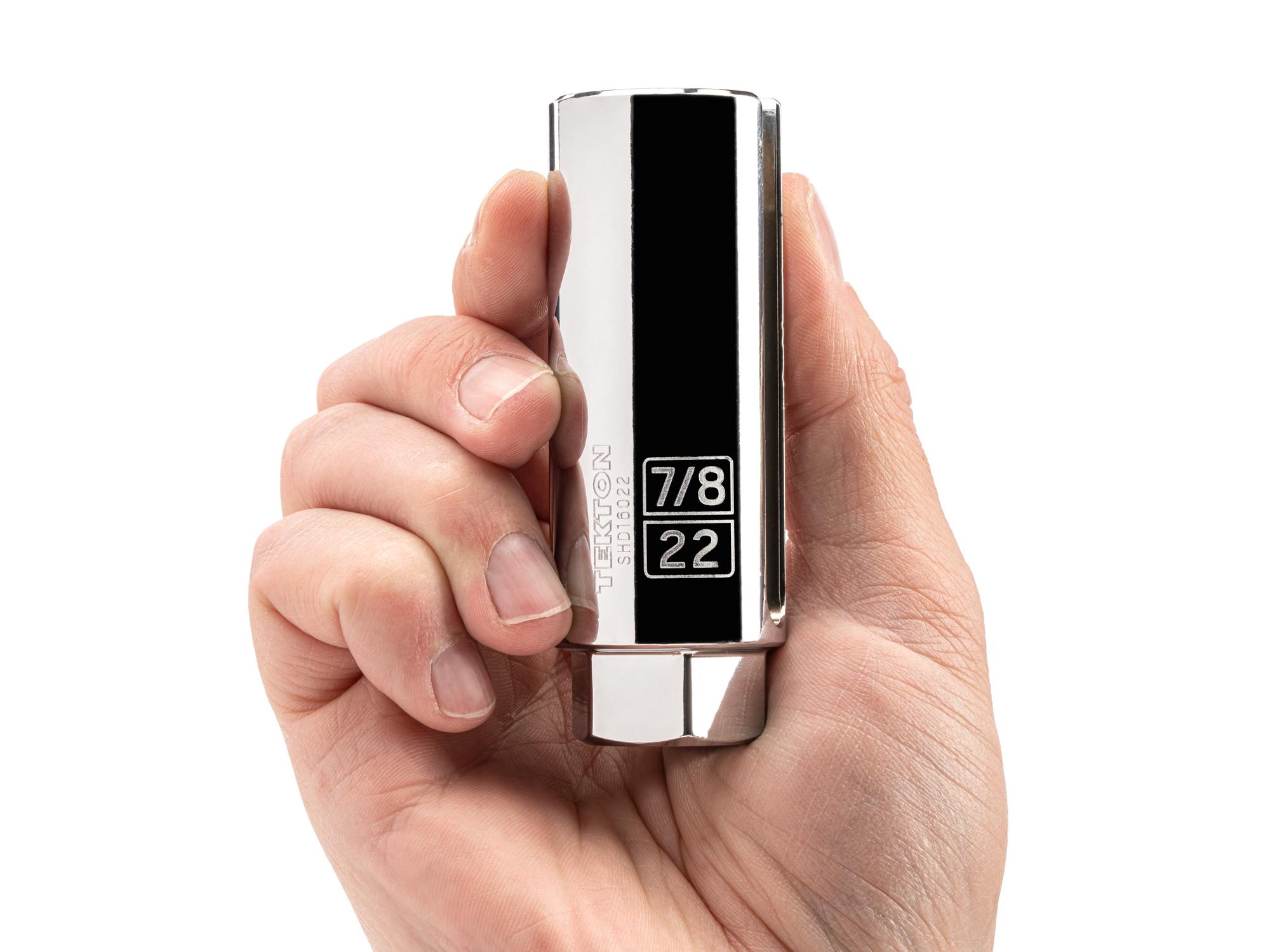 Person holding Tekton hand drive oxygen sensor socket. Item #SHD16022