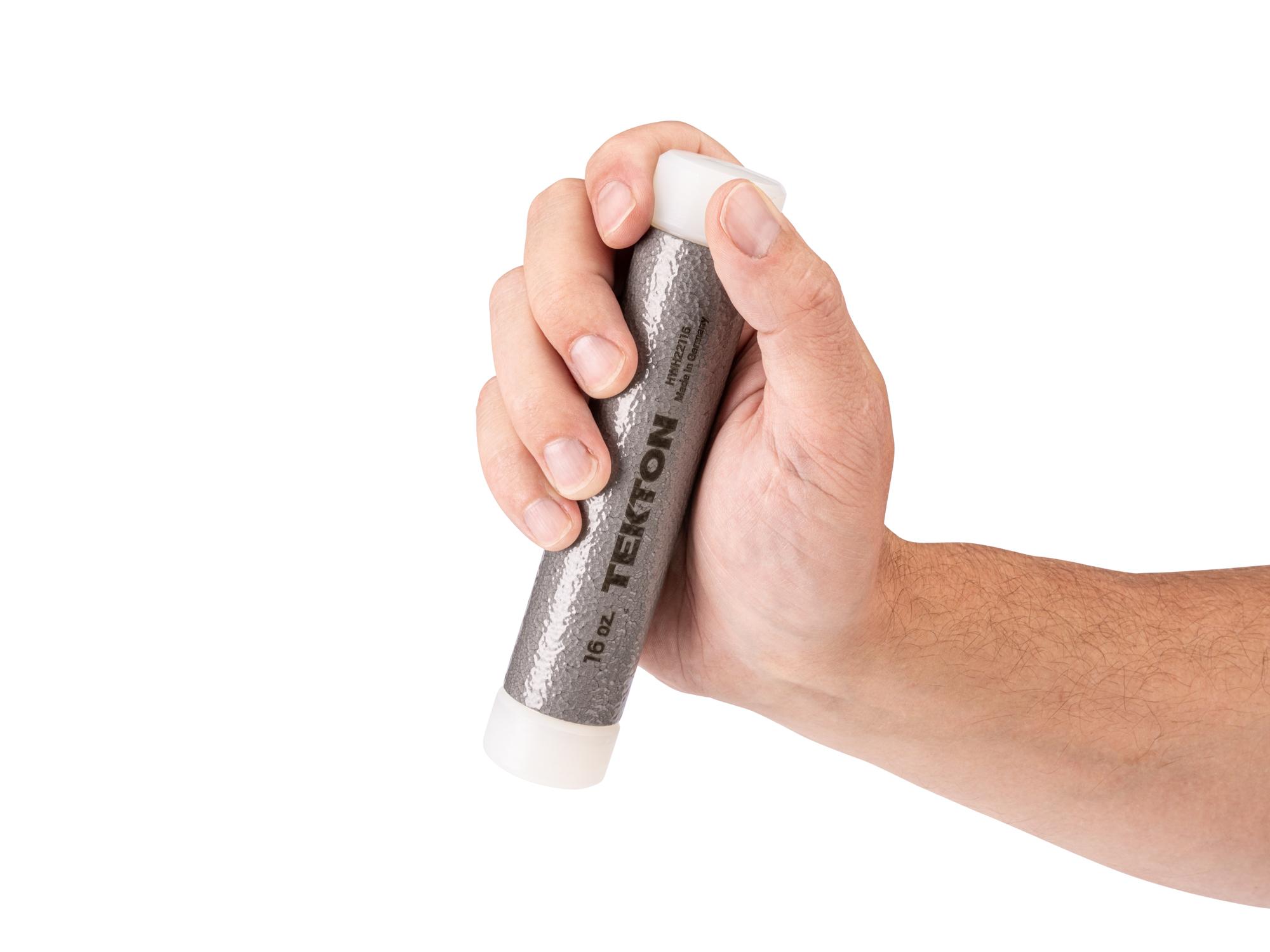 Person holding Tekton heavy hammer. Item #HWH22116