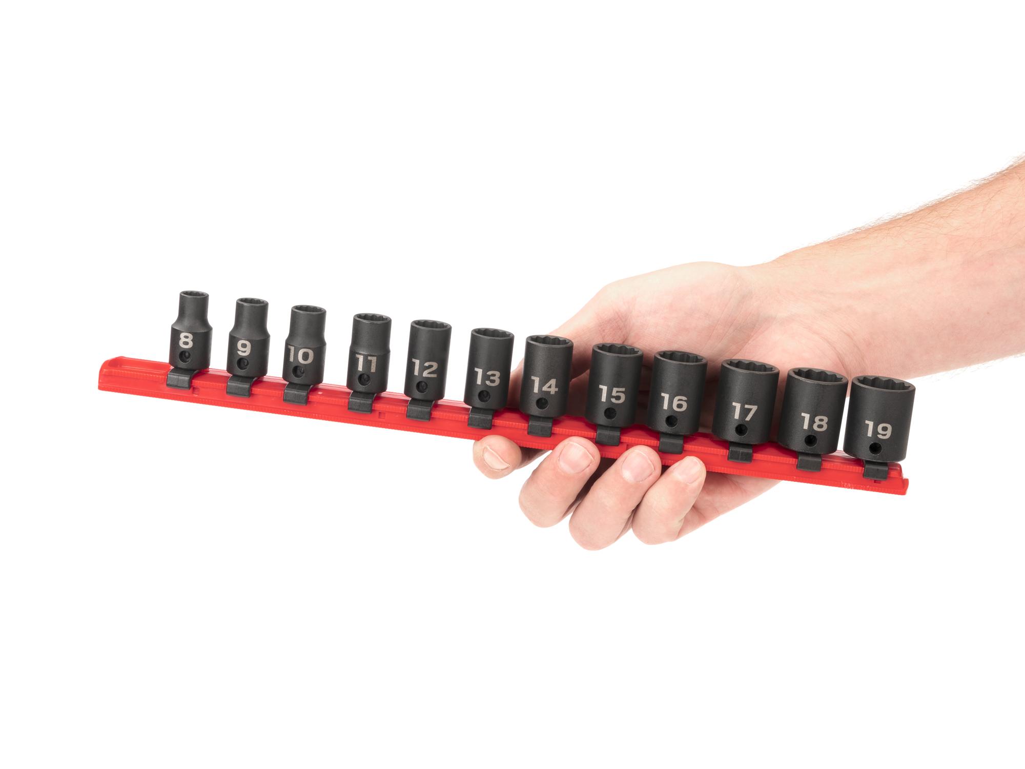 Person holding Tekton rail impact drive 12-point socket set. Item #SID91110