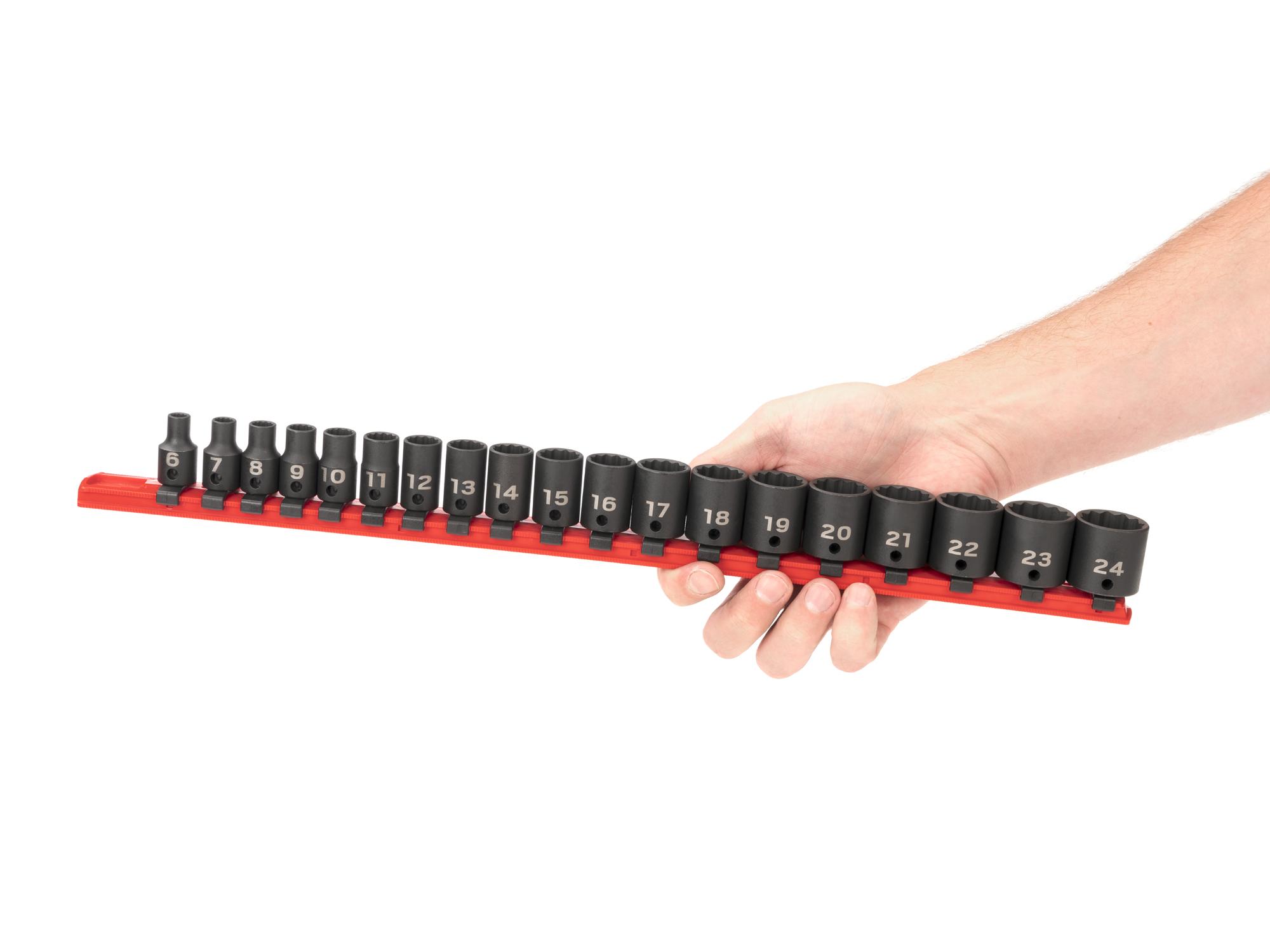 Person holding Tekton rail impact drive 12-point socket set. Item #SID91114