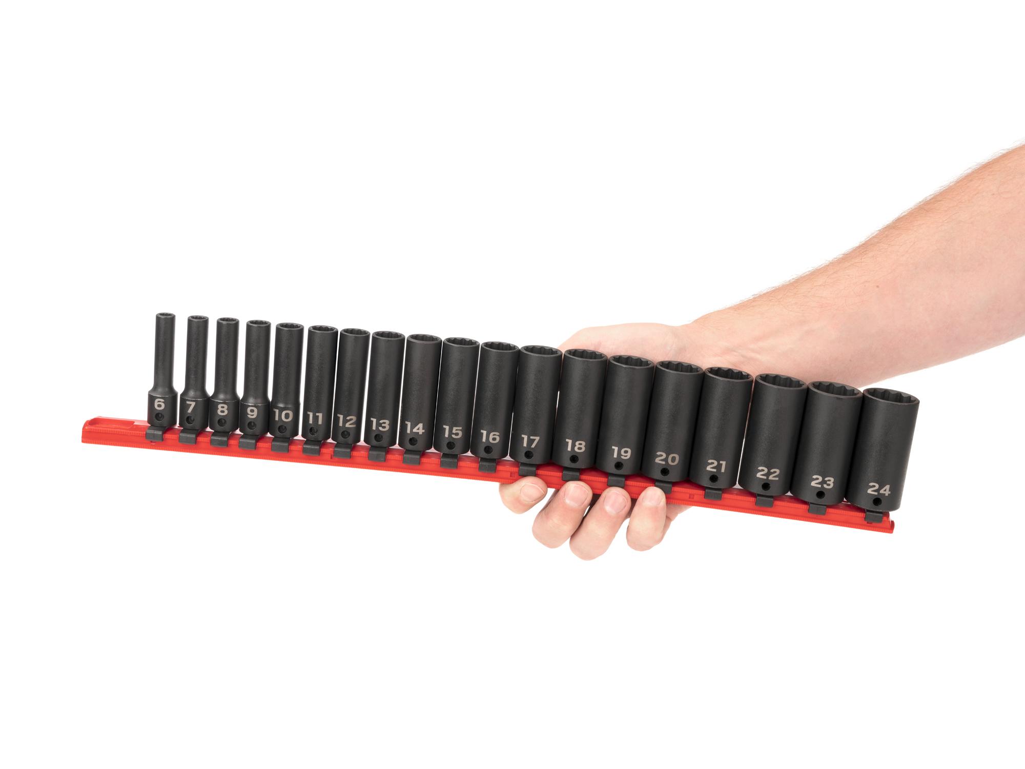 Person holding Tekton rail impact drive 12-point socket set. Item #SID91115