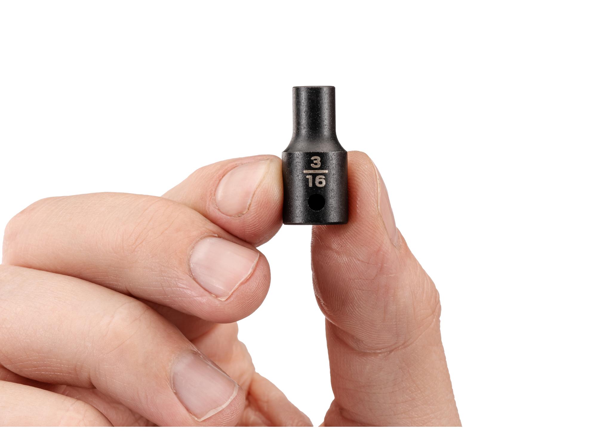 Person holding Tekton impact drive 12-point socket. Item #SID02203
