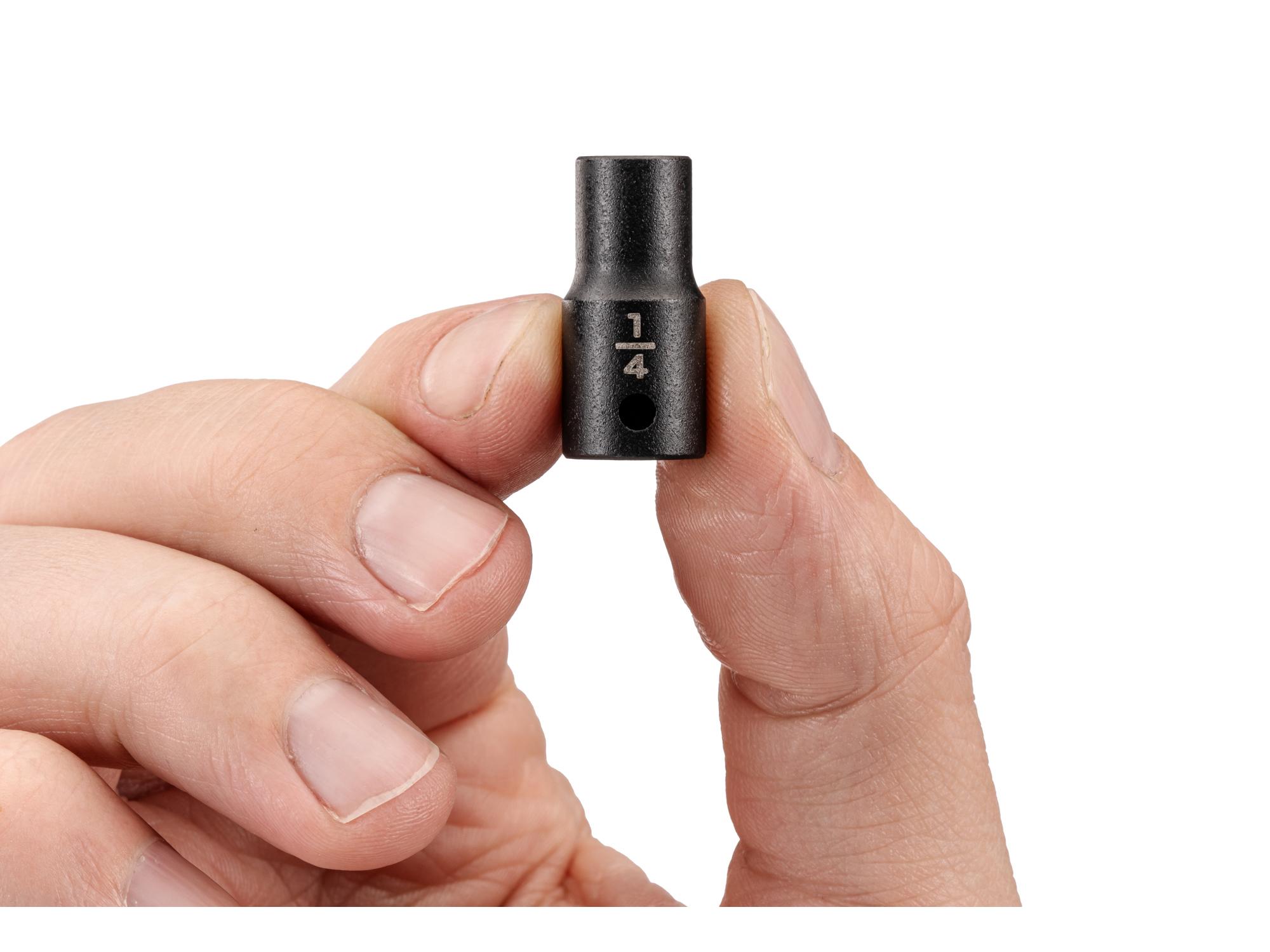 Person holding Tekton impact drive 12-point socket. Item #SID02206