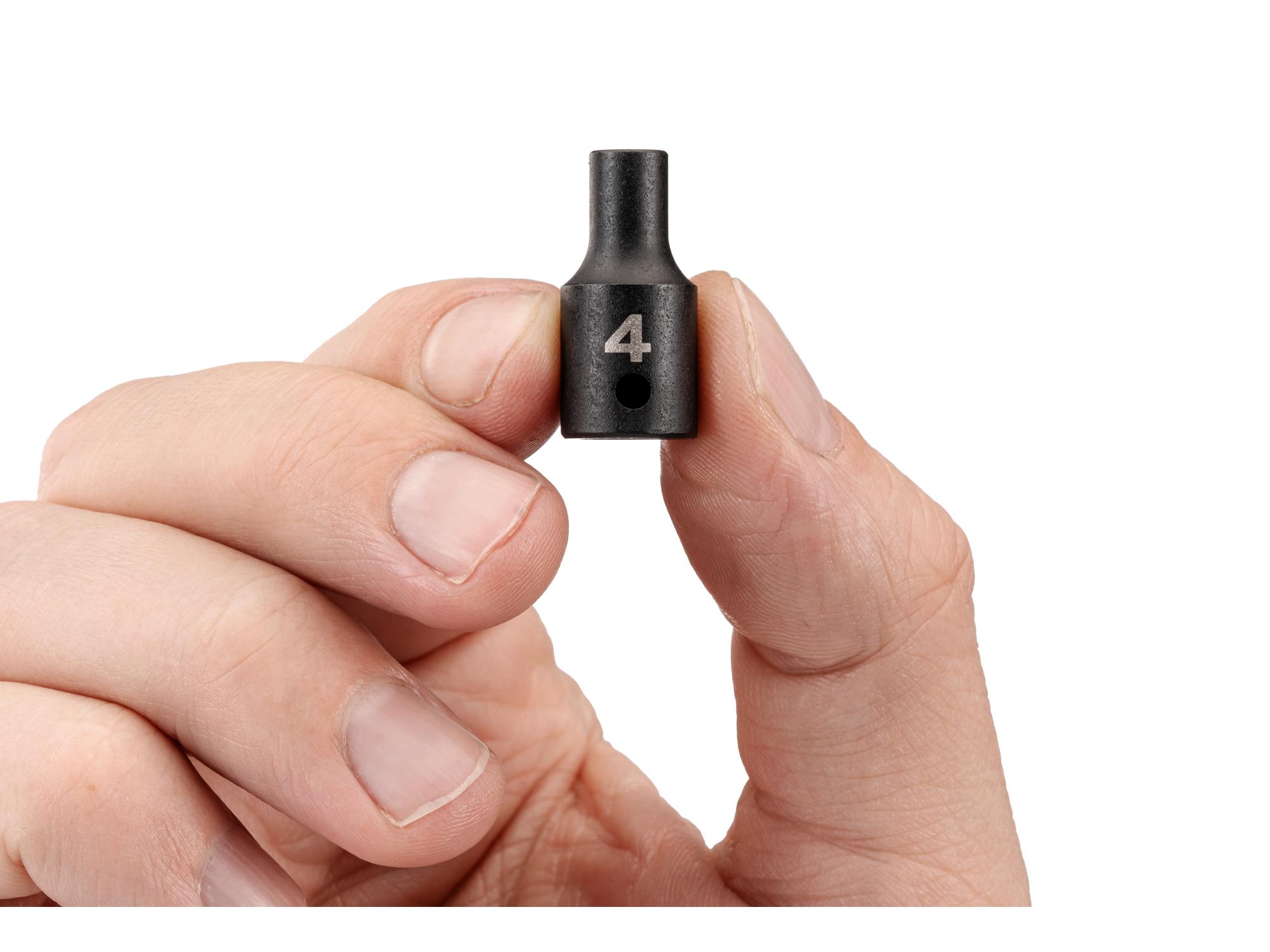 Person holding Tekton impact drive 12-point socket. Item #SID02302