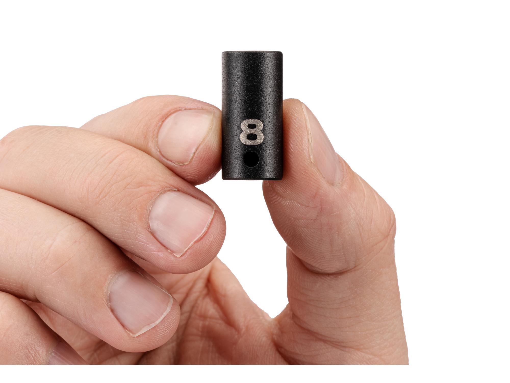 Person holding Tekton impact drive 12-point socket. Item #SID02308