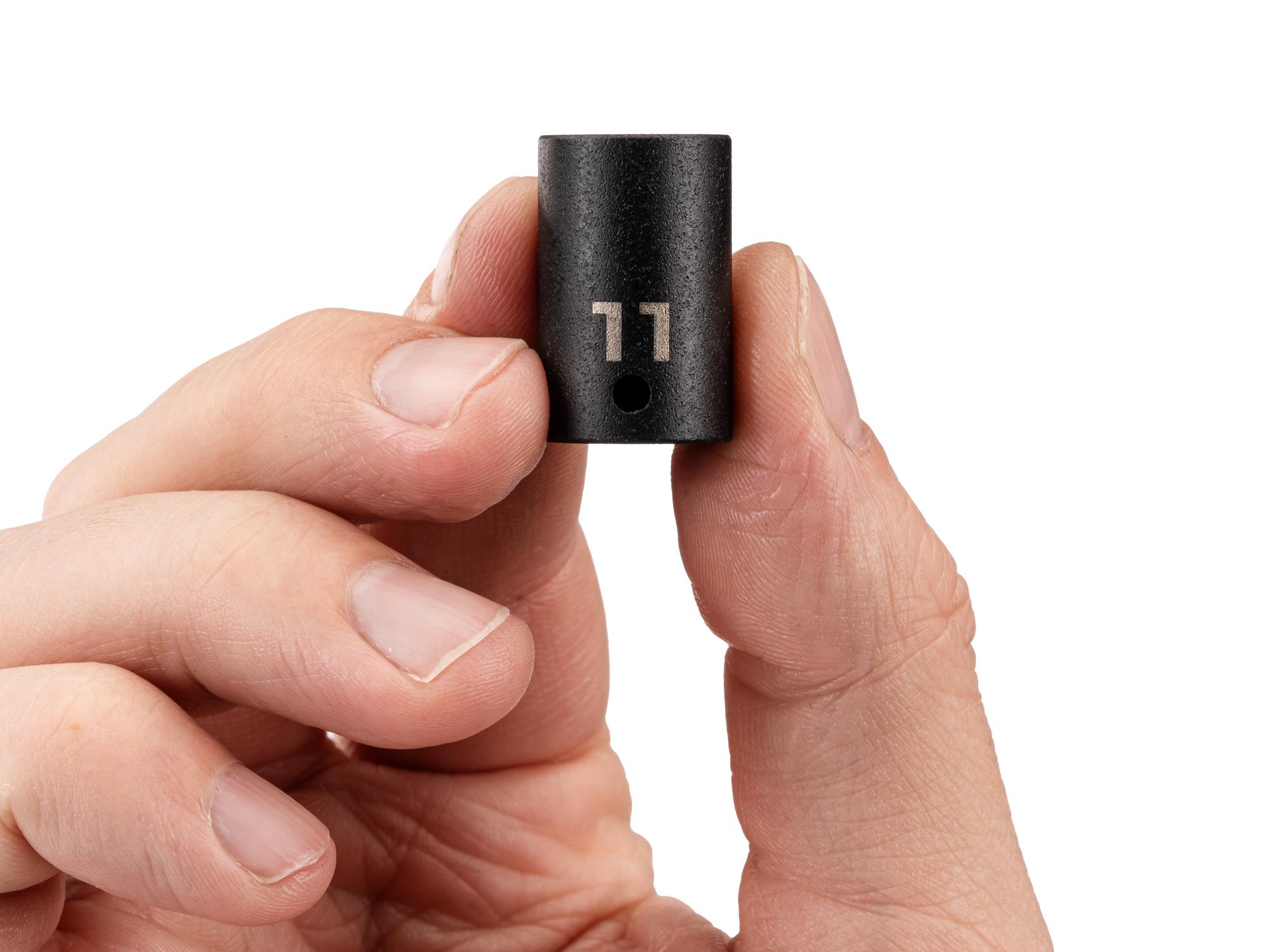 Person holding Tekton impact drive 6-point socket. Item #SID02111