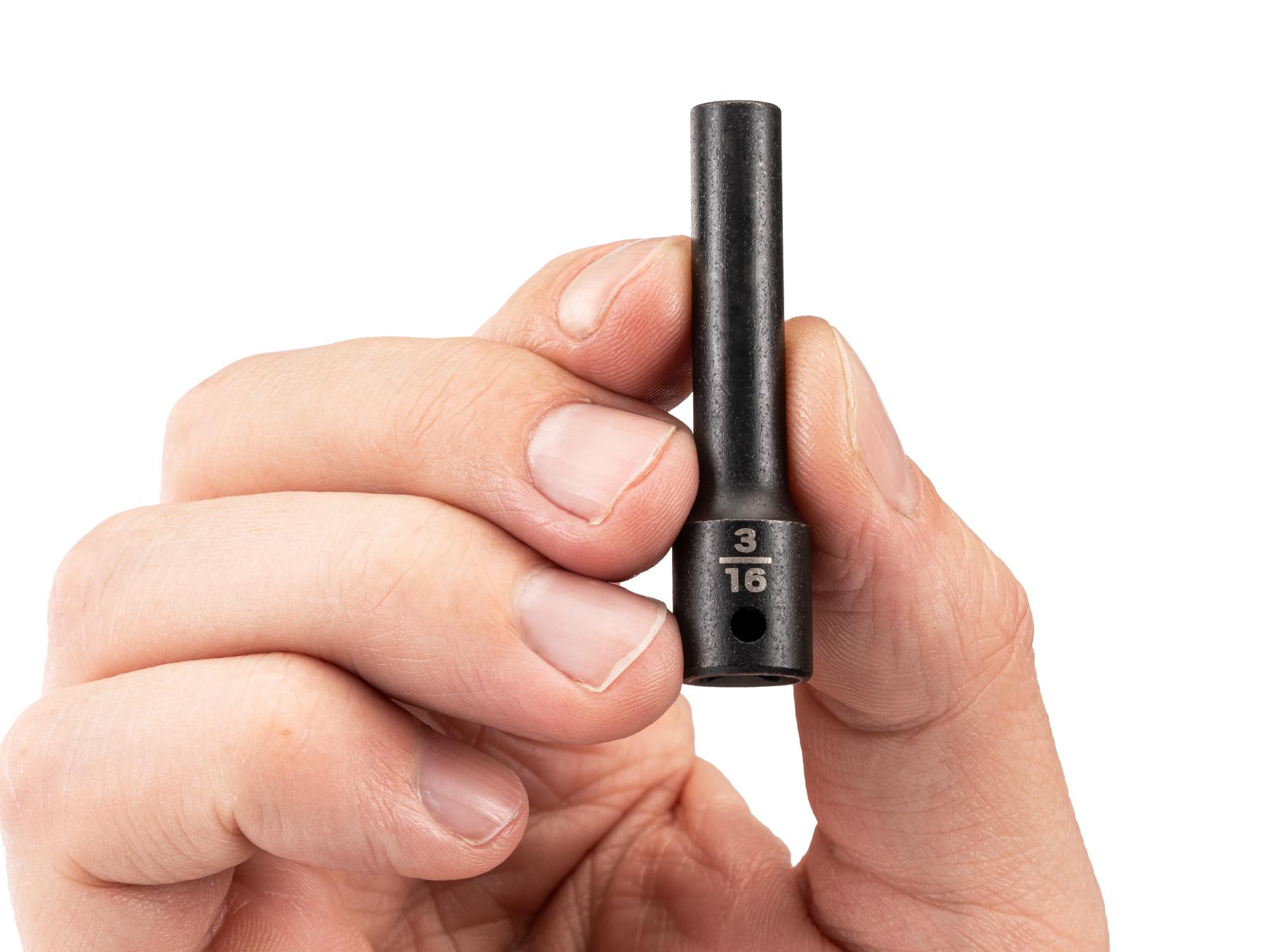 Person holding Tekton impact drive 6-point socket. Item #SID03003