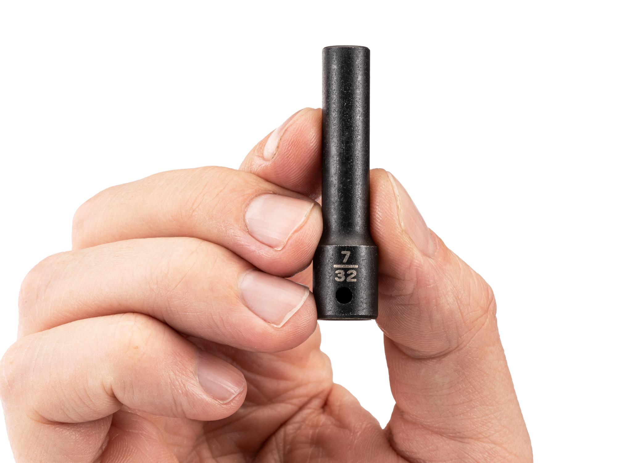 Person holding Tekton impact drive 6-point socket. Item #SID03005