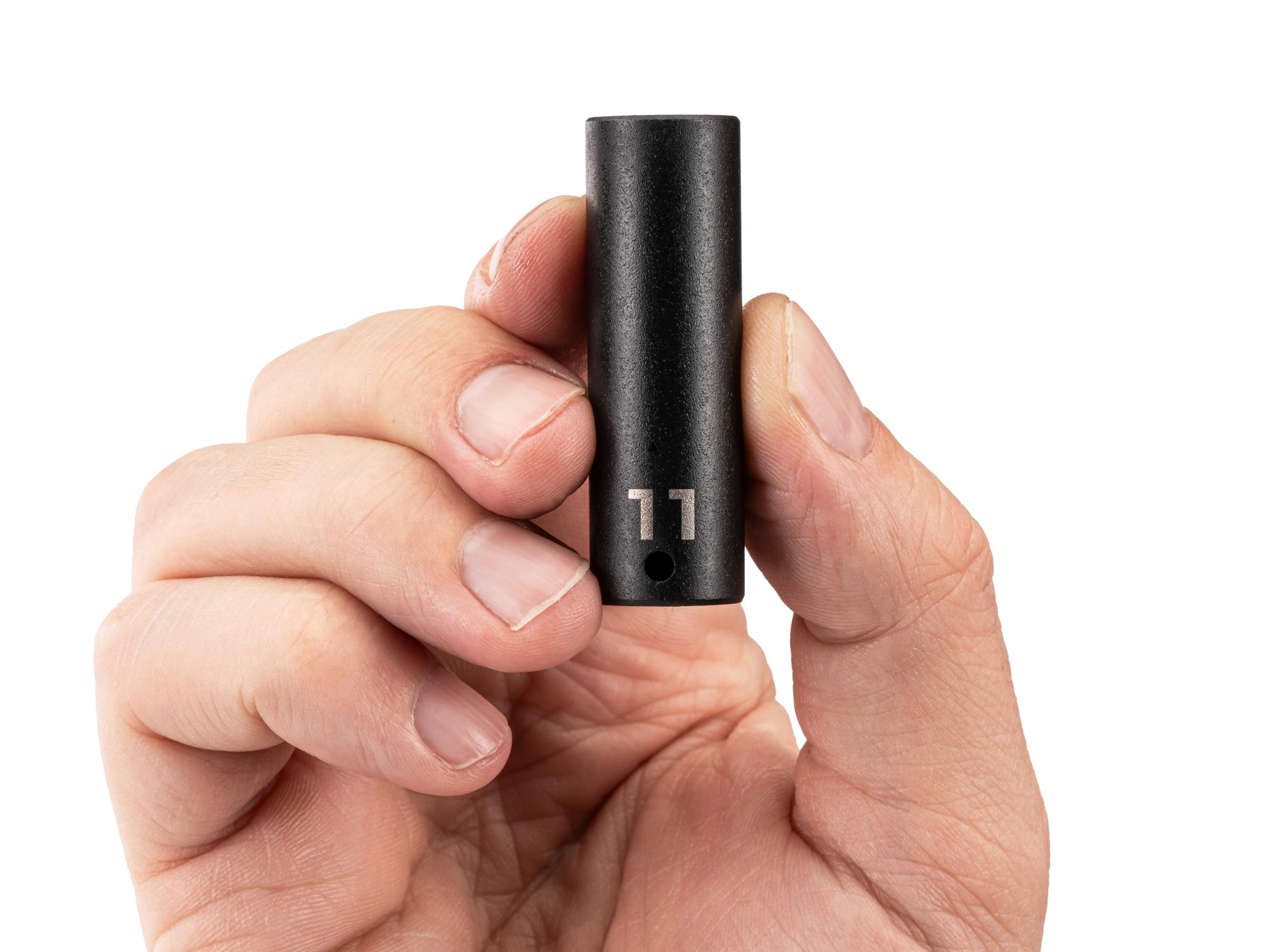 Person holding Tekton impact drive 6-point socket. Item #SID03111